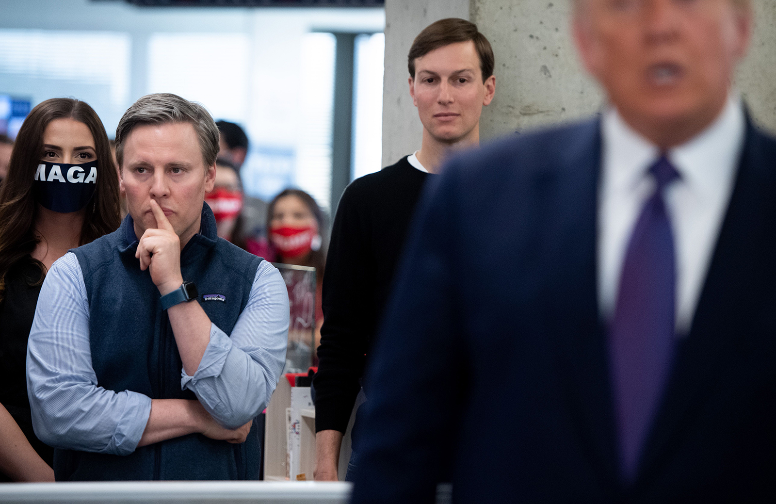 Campaign Manager Bill Stepien, left, listens as President Donald Trump visits his campaign headquarters in Arlington, Virginia, November 3.