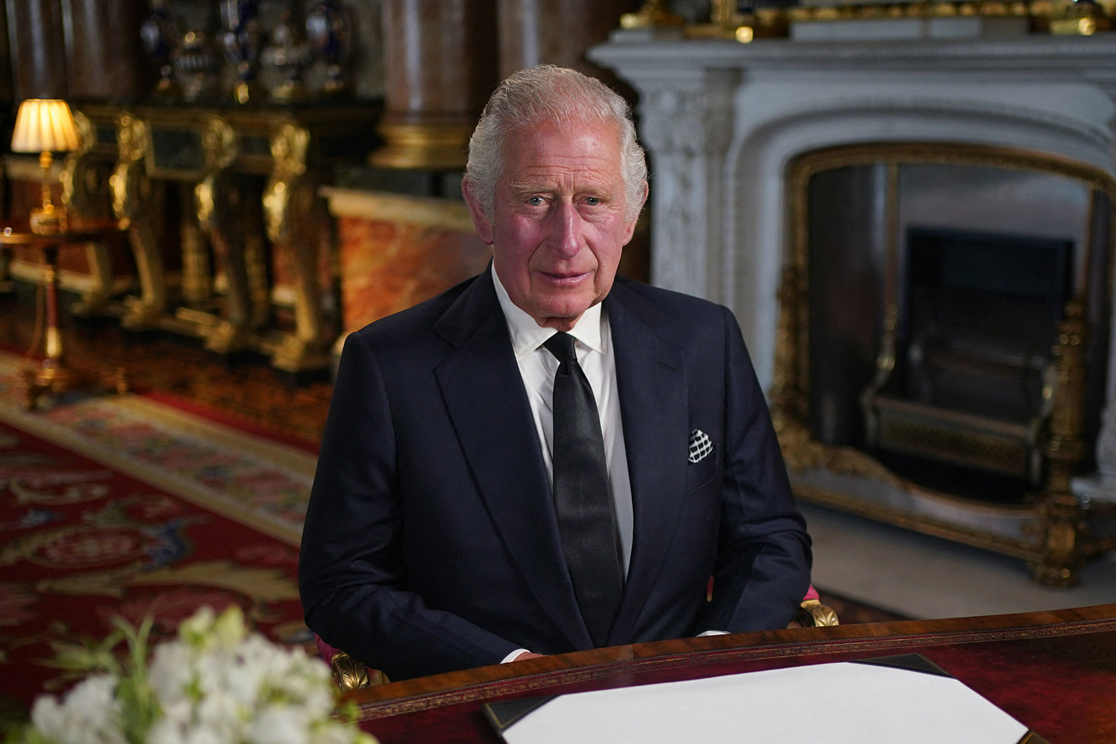 Britain's King Charles III delivers his address to the nation and the Commonwealth from Buckingham Palace, in London on September 9.
