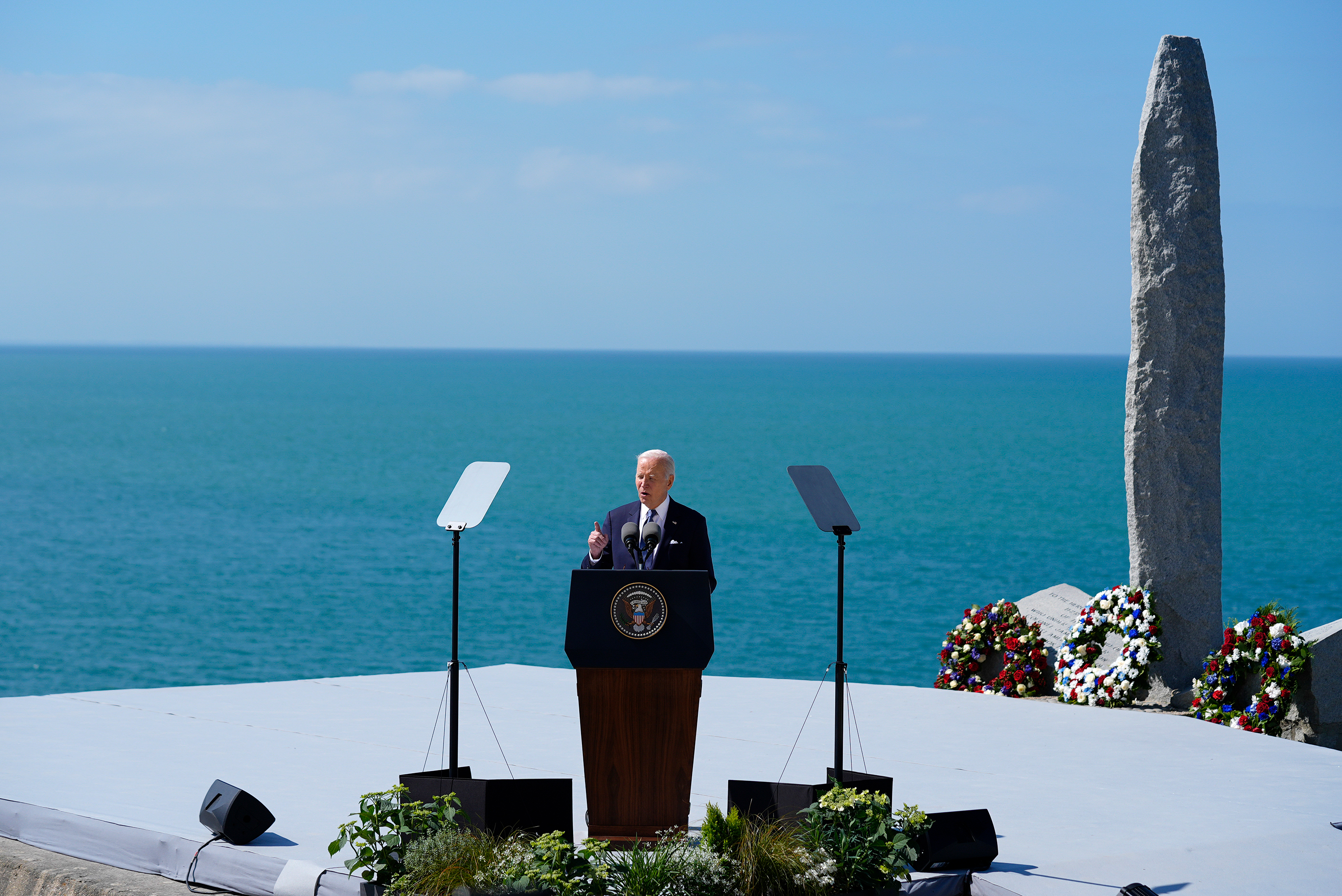 US President Joe Biden delivers a speech at the Pointe du Hoc monument in Normandy, France, on Friday.