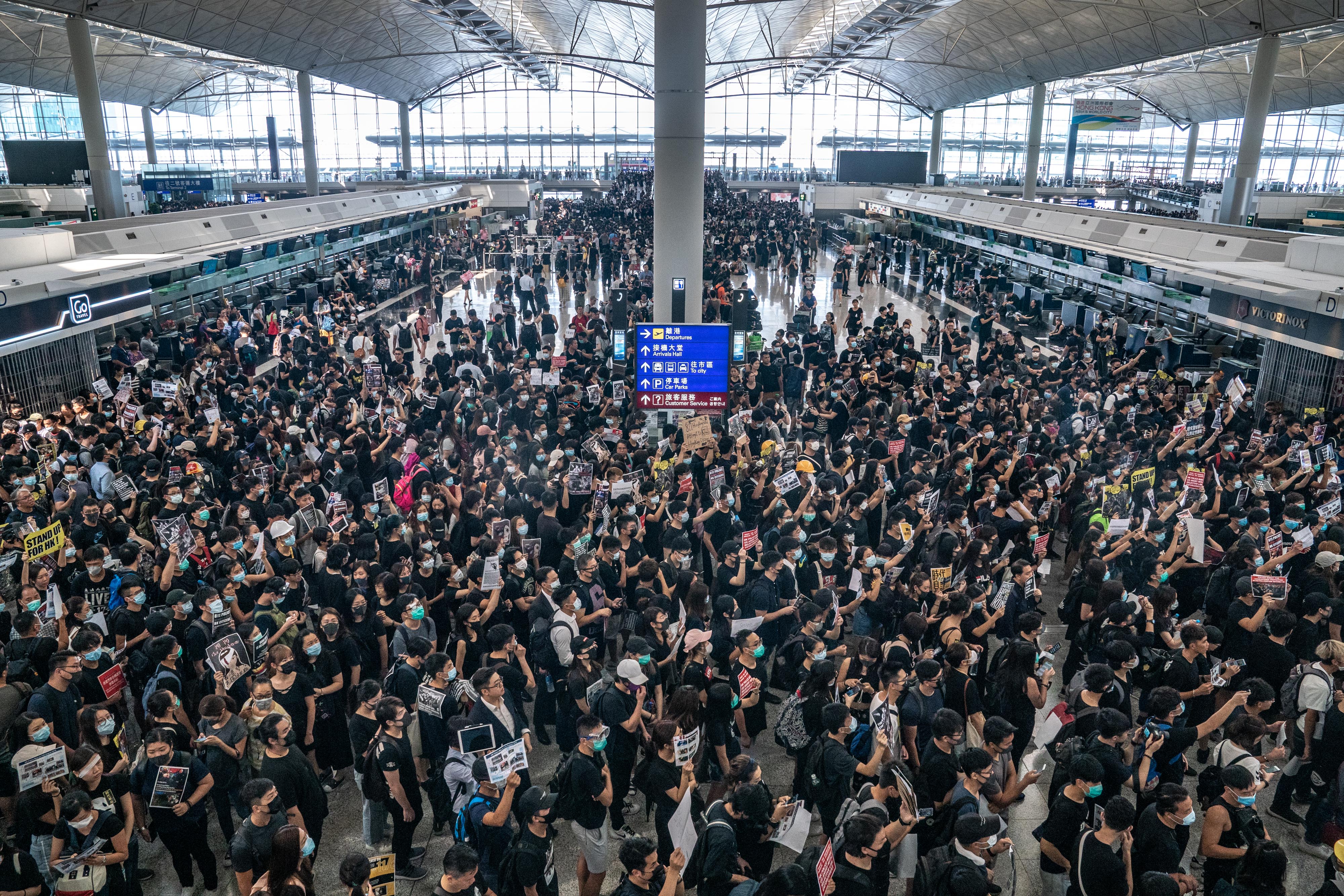 Protesters occupy the departure hall of the Hong Kong International Airport during a demonstration on August 12, 2019.