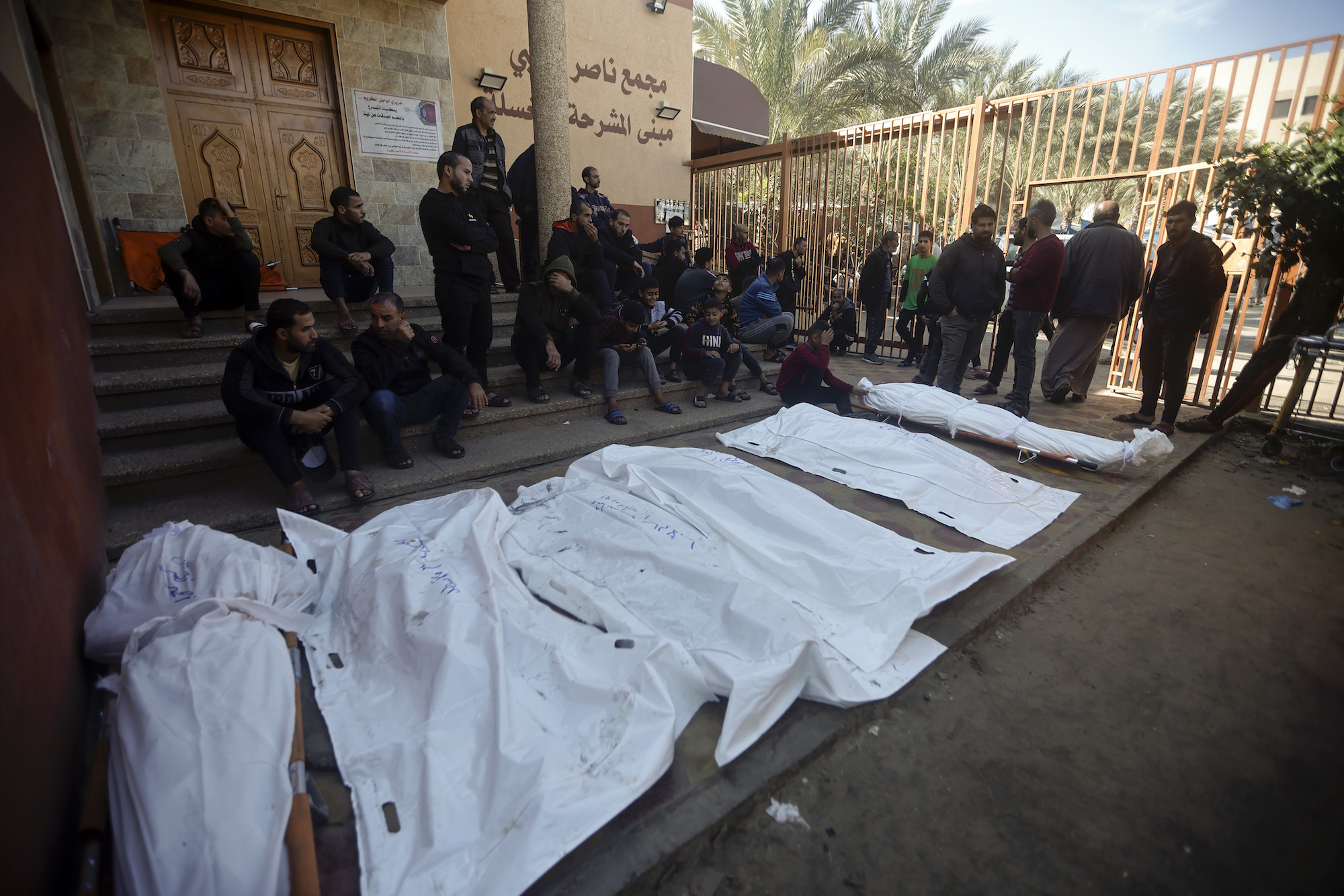 Palestinians mourn relatives killed in a Israeli bombardment in Khan Younis on Friday.