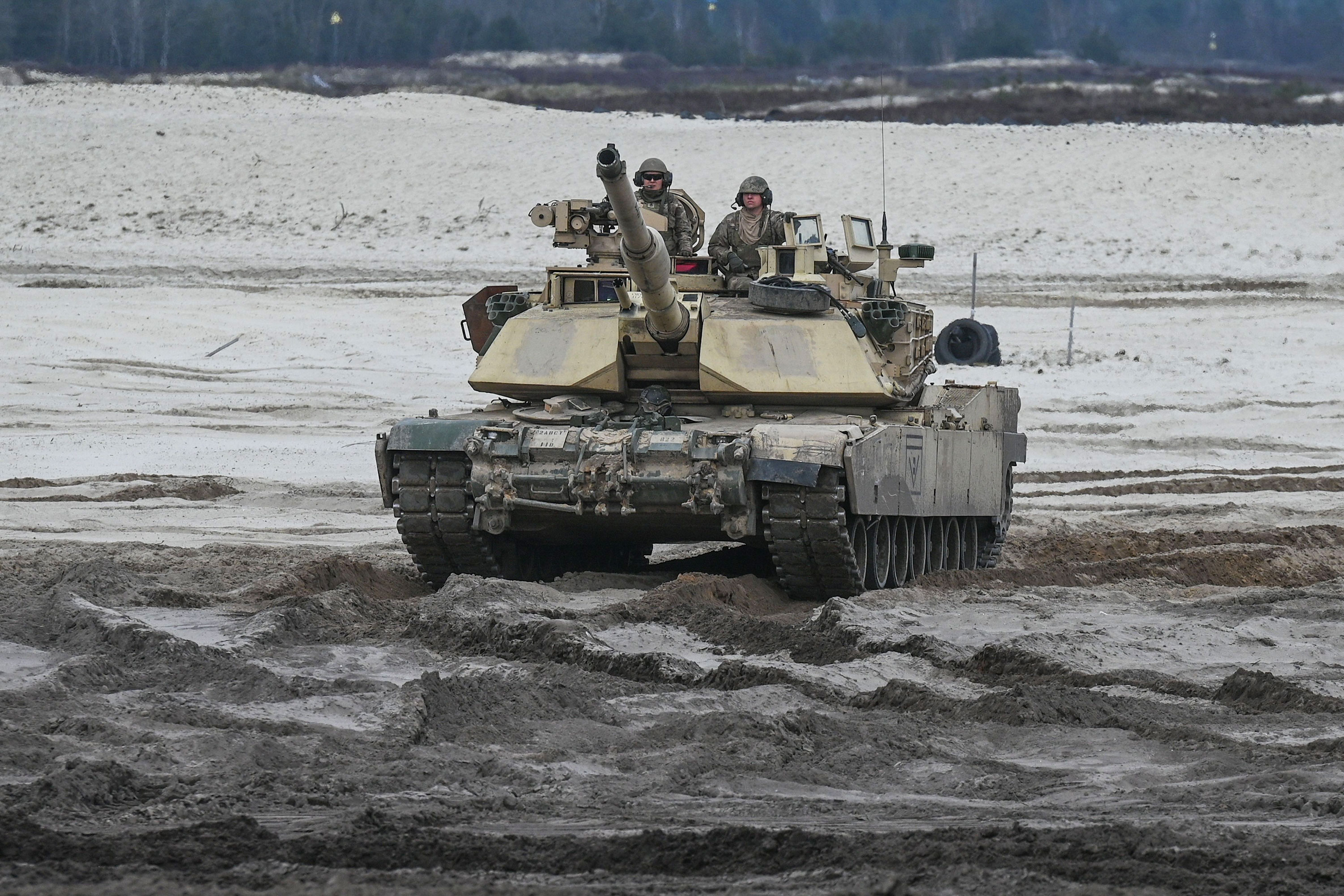 US soldiers train with an Abrams M1 tank in Nowa Deba, Poland, on April 12.