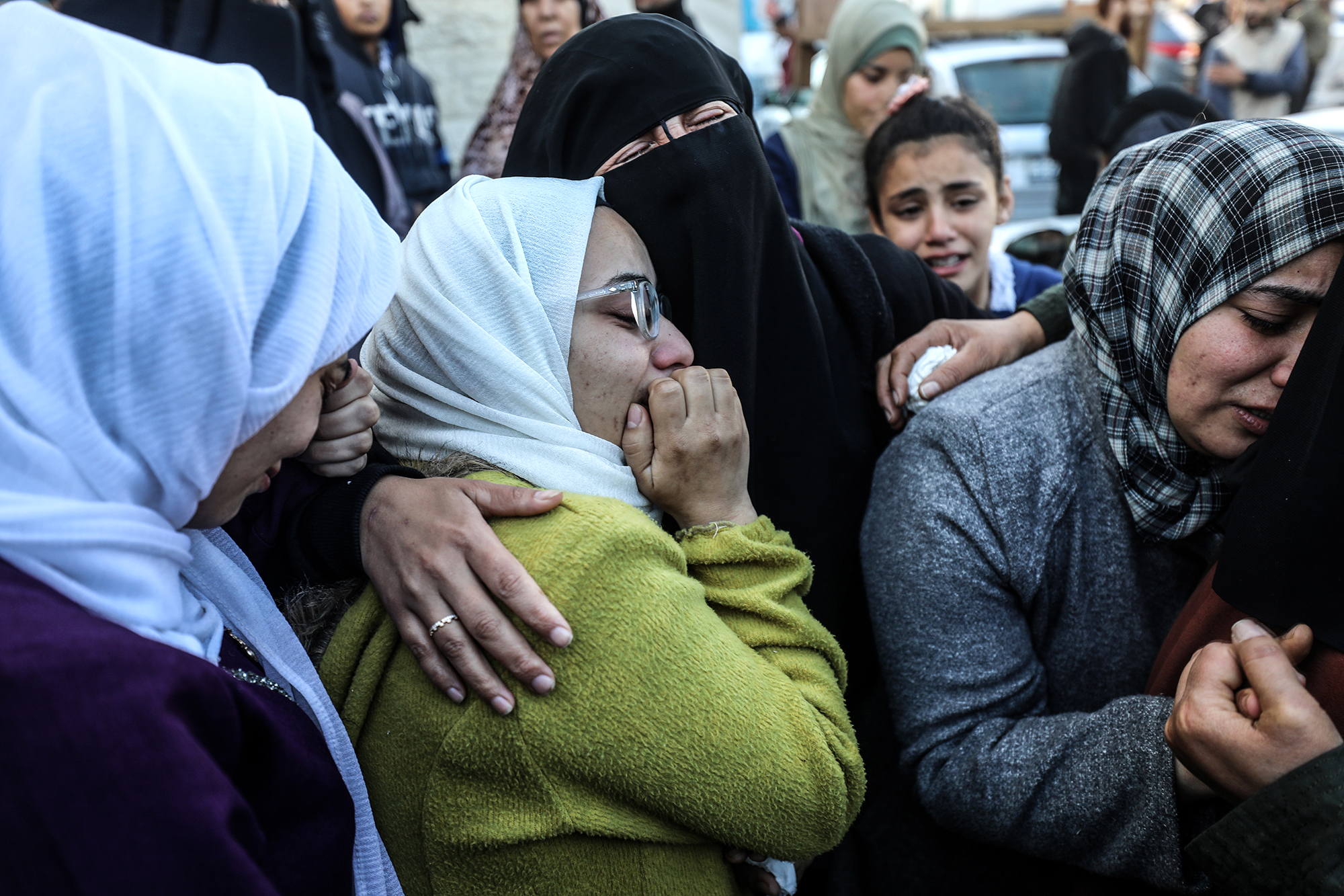 Palestinians mourn relatives who were killed in an Israeli strike in Deir Al-Balah, Gaza, on January 5. 