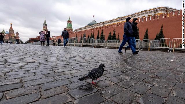 People walk on Red Square in downtown Moscow on February 19, 2020.