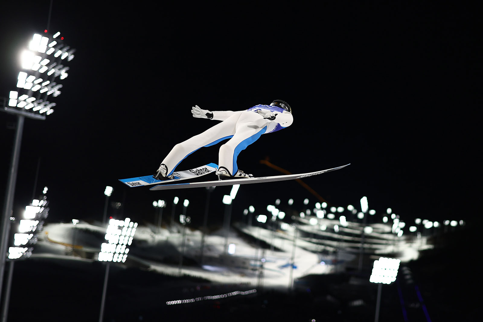 Slovenia's Peter Prevc jumps during the mixed team ski jumping on February 7.