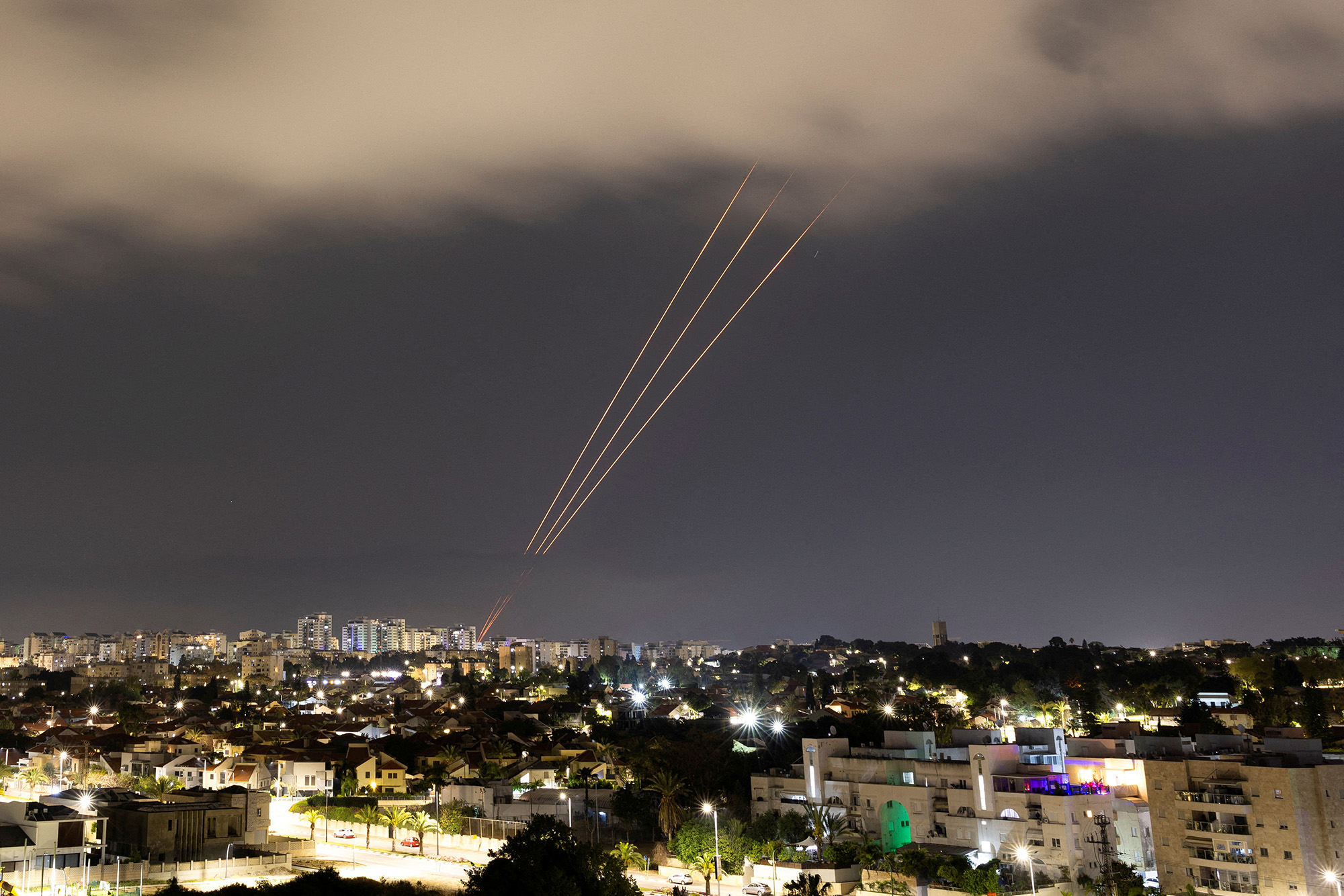 An anti-missile system operates after Iran launched drones and missiles towards Israel, as seen from Ashkelon, Israel on April 14.
