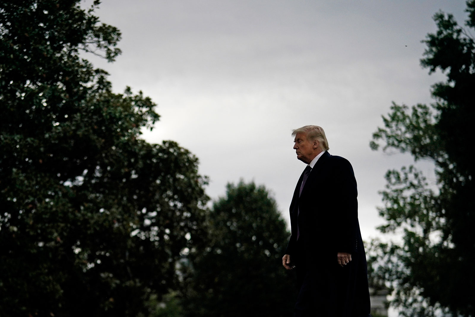 U.S. President Donald walks to the White House residence on the South Lawn of the White House on October 1.