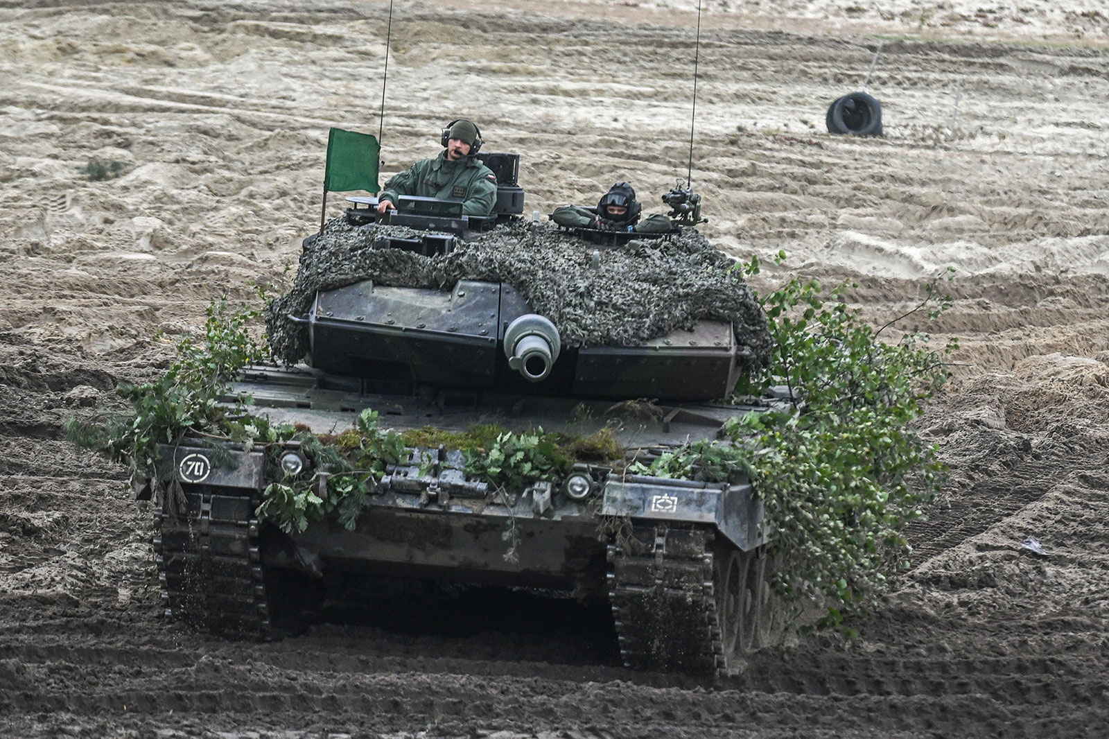 Polish military drive a Leopard tank during a live fire demonstration part of the Bear 22 military exercises at the Nowa Deba training ground in Poland last year. 