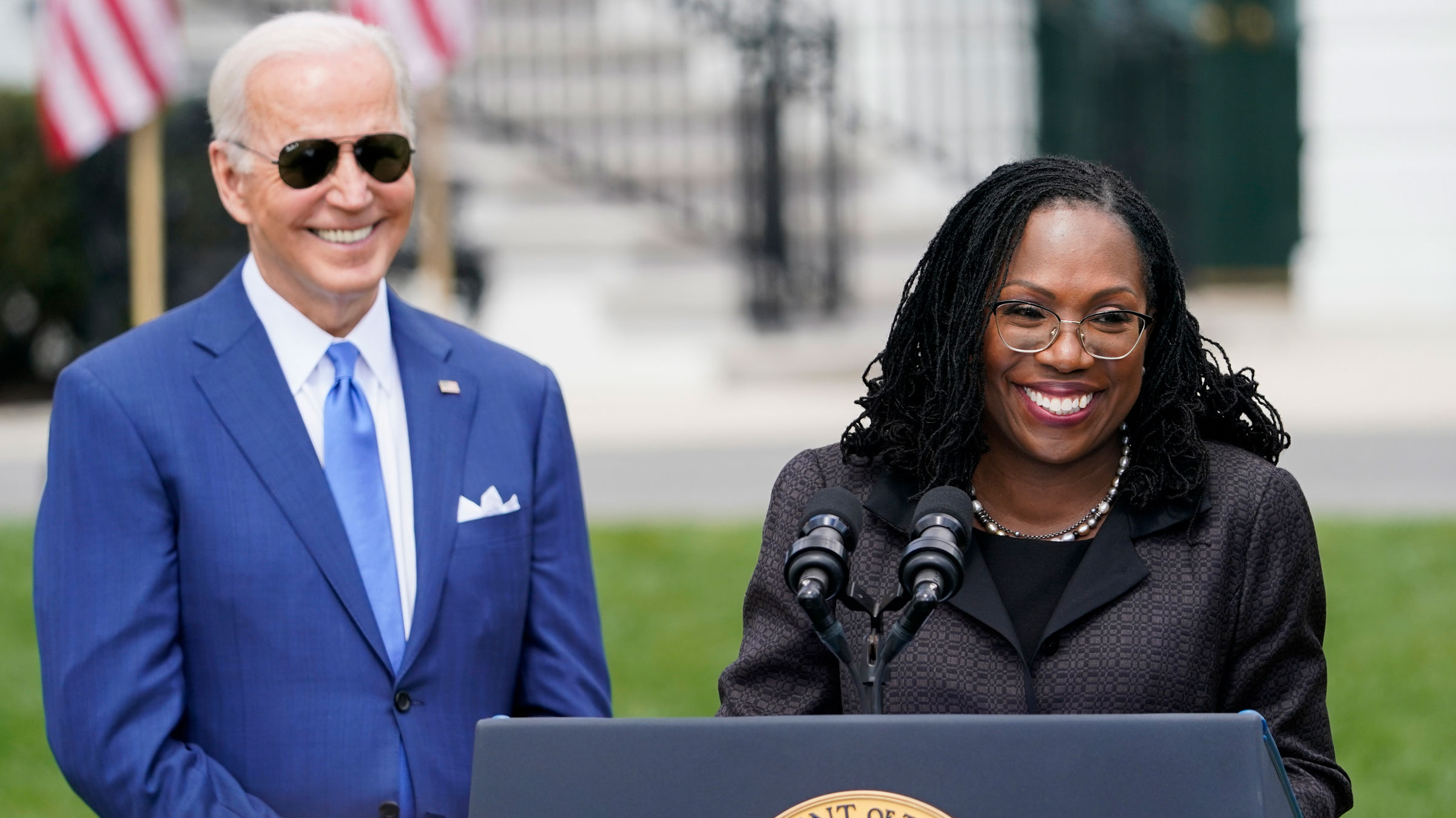 President Joe Biden listens as Ketanji Brown Jackson speaks at the White House in April.