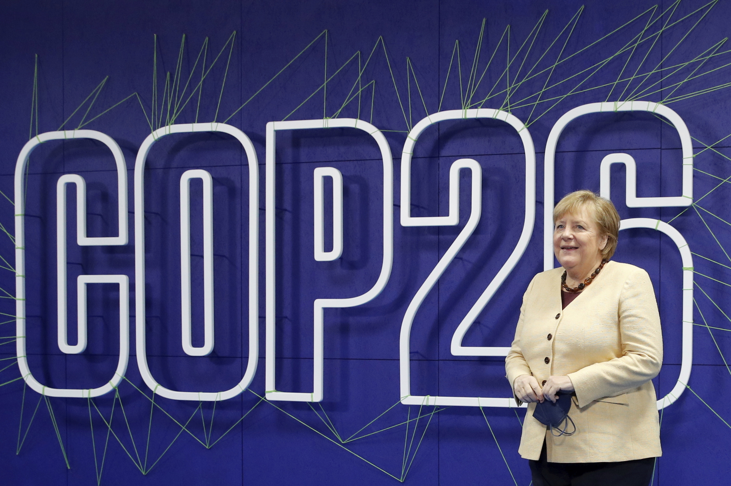 German Chancellor Angela Merkel arrives at the COP26 summit Monday.