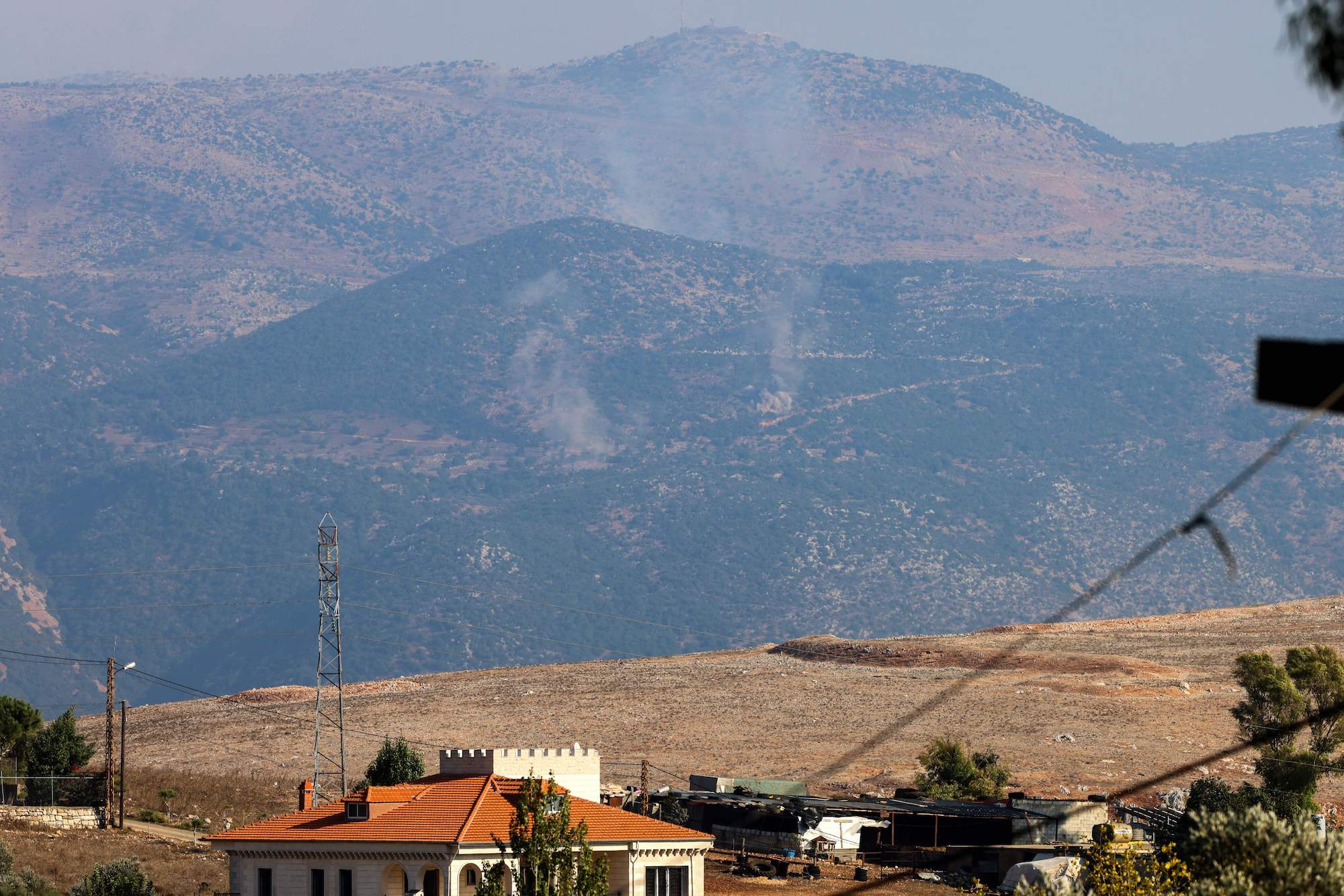 A picture taken from the Lebanese town of Marjayoun shows smoke billowing in the disputed border area of Shebaa Farms on Saturday.