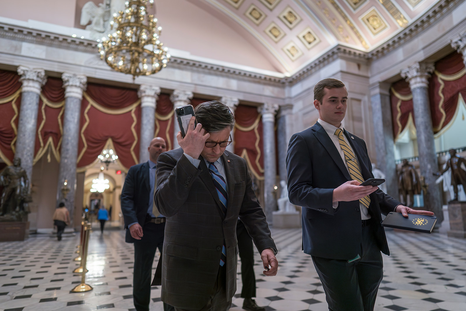 House Speaker Mike Johnson walks through Statuary Hall as lawmakers gather in the House chamber to vote on the articles of impeachment against Homeland Security Secretary Alejandro Mayorkas on February 6.