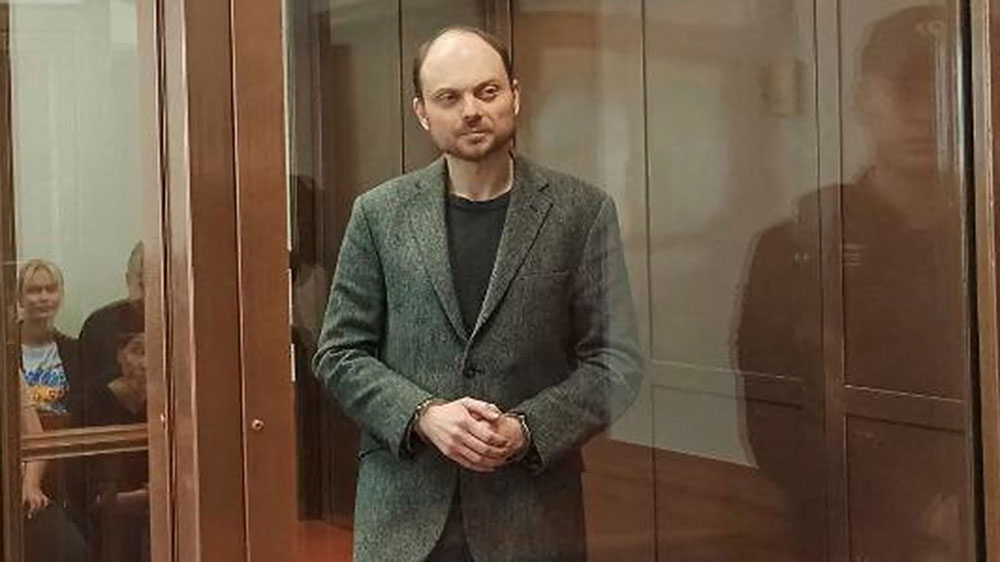 Kremlin critic Vladimir Kara-Murza, accused of treason and of discrediting the Russian army, stands inside an enclosure for defendants during a court hearing in Moscow, on April 17.