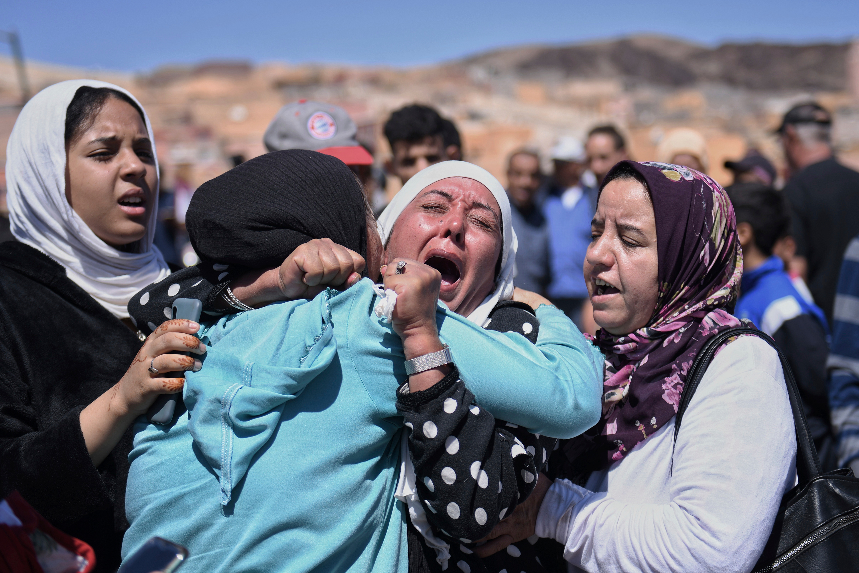 Women mourn loved ones killed in the earthquake in Moulay Brahim, Morocco on September 10. 