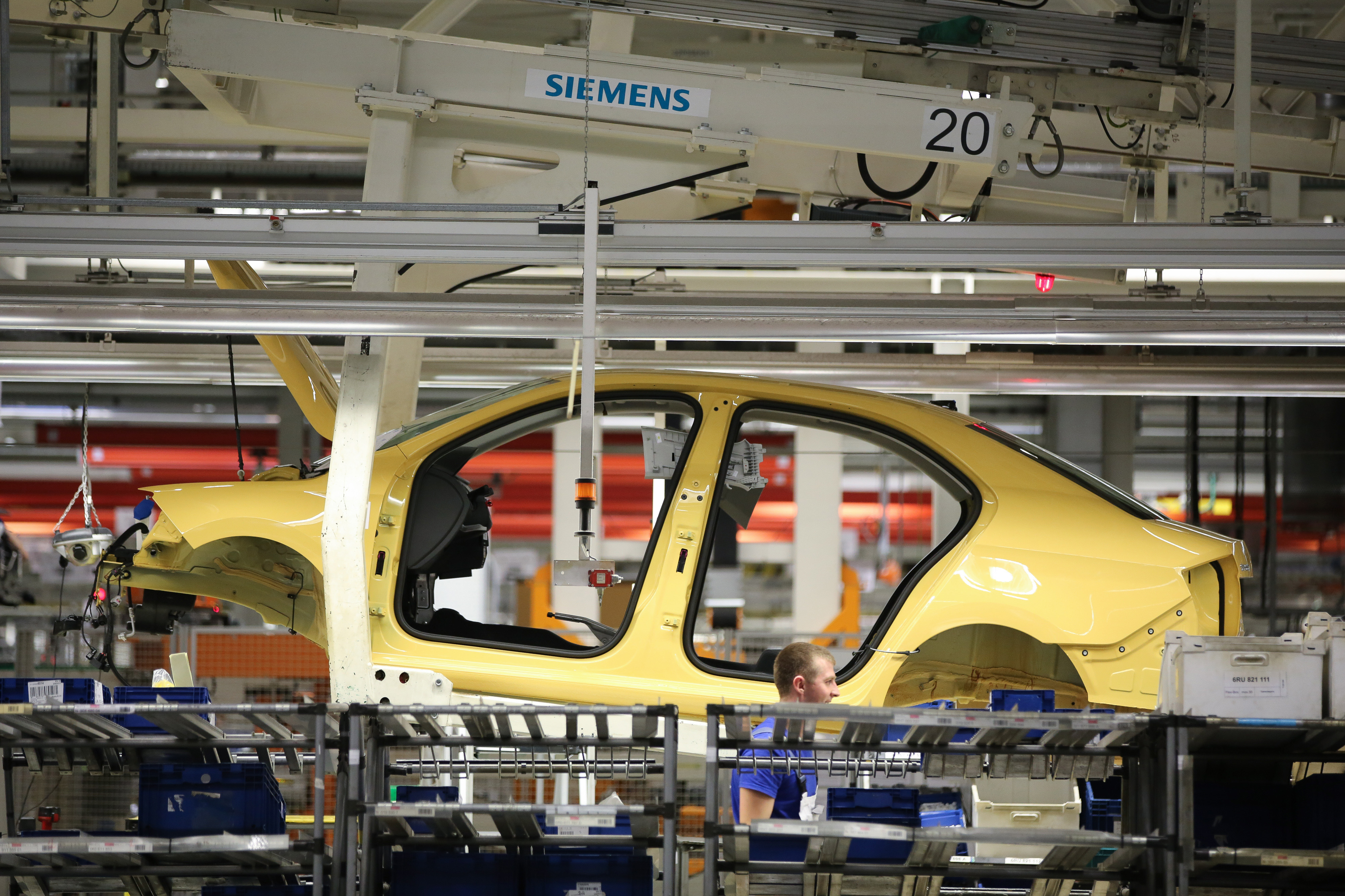 The body shell of a Skoda Auto AS Radi automobile passes along the production line at the Volkswagen Group Rus OOO plant in Kaluga, Russia, on September 19, 2017. 