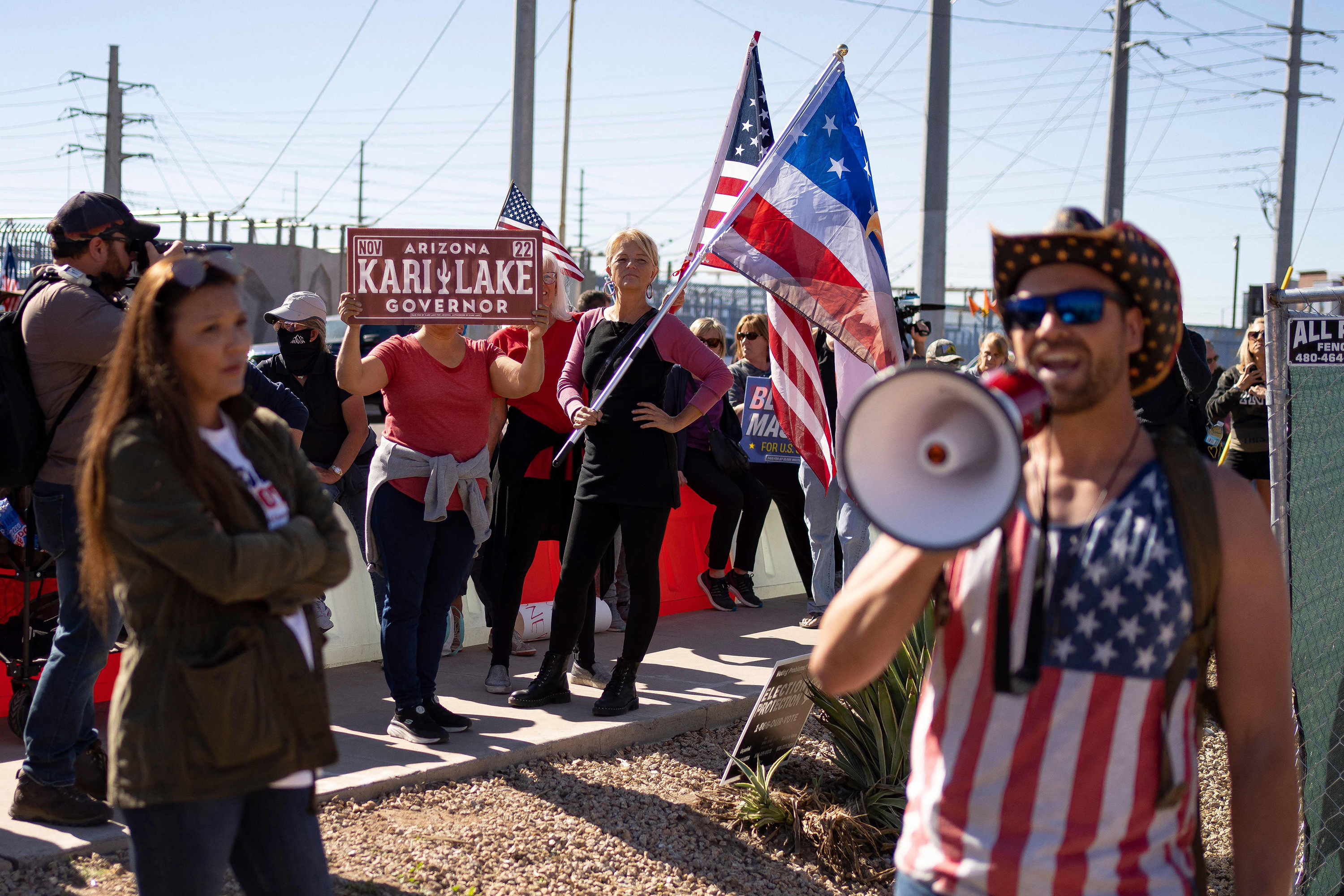 Demonstrators gather at a rally to protest midterm election results outside of Maricopa County Tabulation and Election Center in Phoenix, Arizona, on November 12.