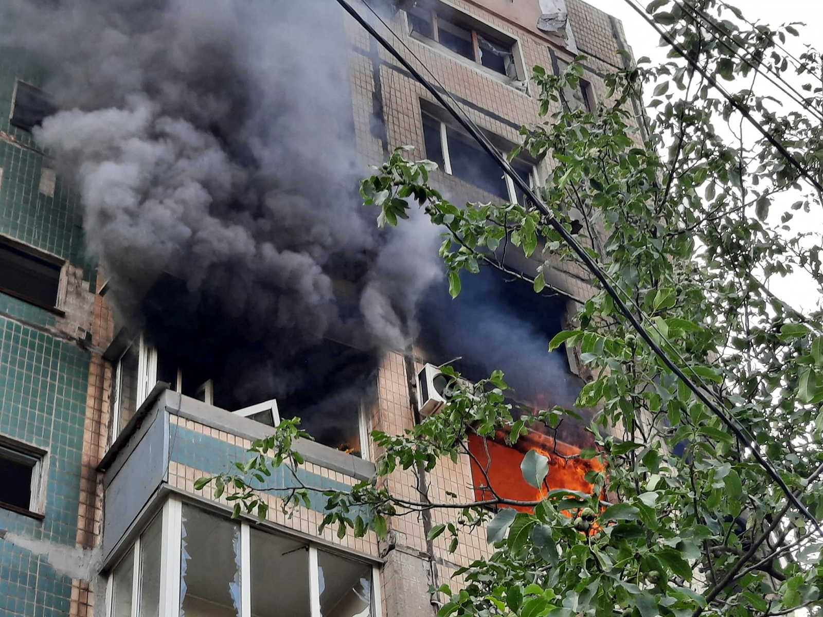 An apartment building burns after it was hit by a Russian missile strike in Kryvyi Rih, Ukraine, on July 31.