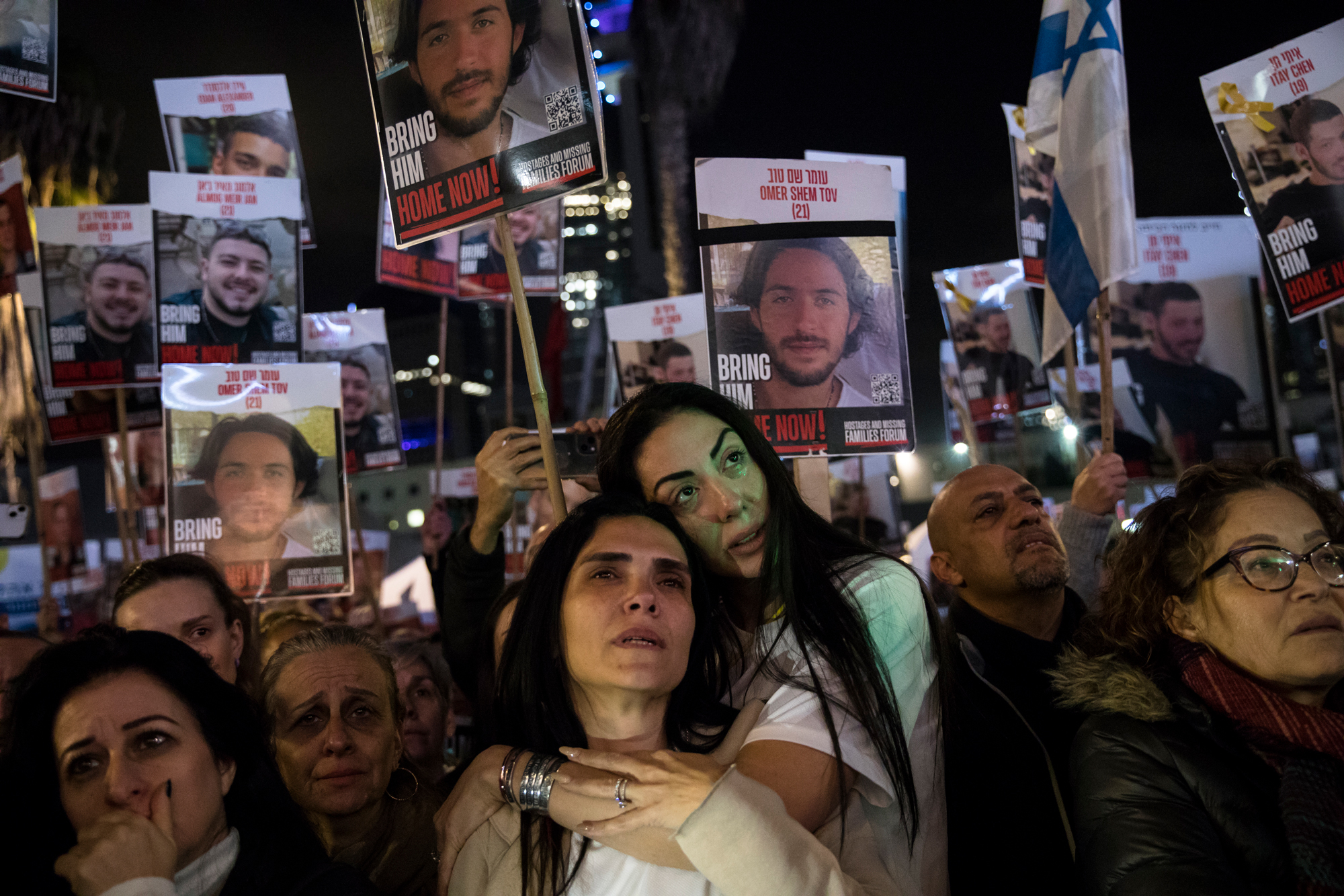 People react during a rally to mark 100 days of captivity for hostages by Hamas in Gaza on January 13 in Tel Aviv, Israel.