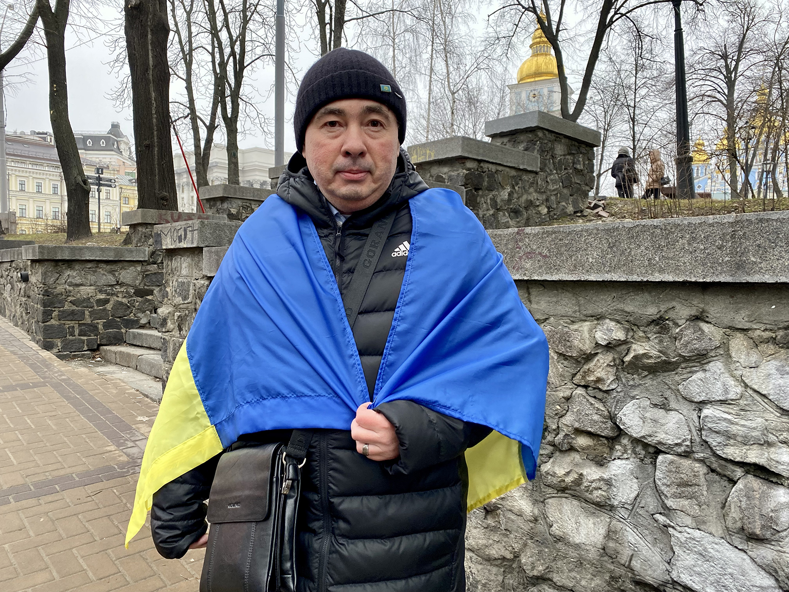 Alim, who is from Crimea, says he has been carrying his Ukrainian flag around every day for the past eight years -- ever since Russia annexed the peninsula.