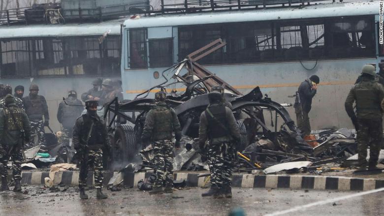 Indian security forces inspect the remains of a bus following an attack on a paramilitary convoy on February 14 in Indian-controlled Kashmir.