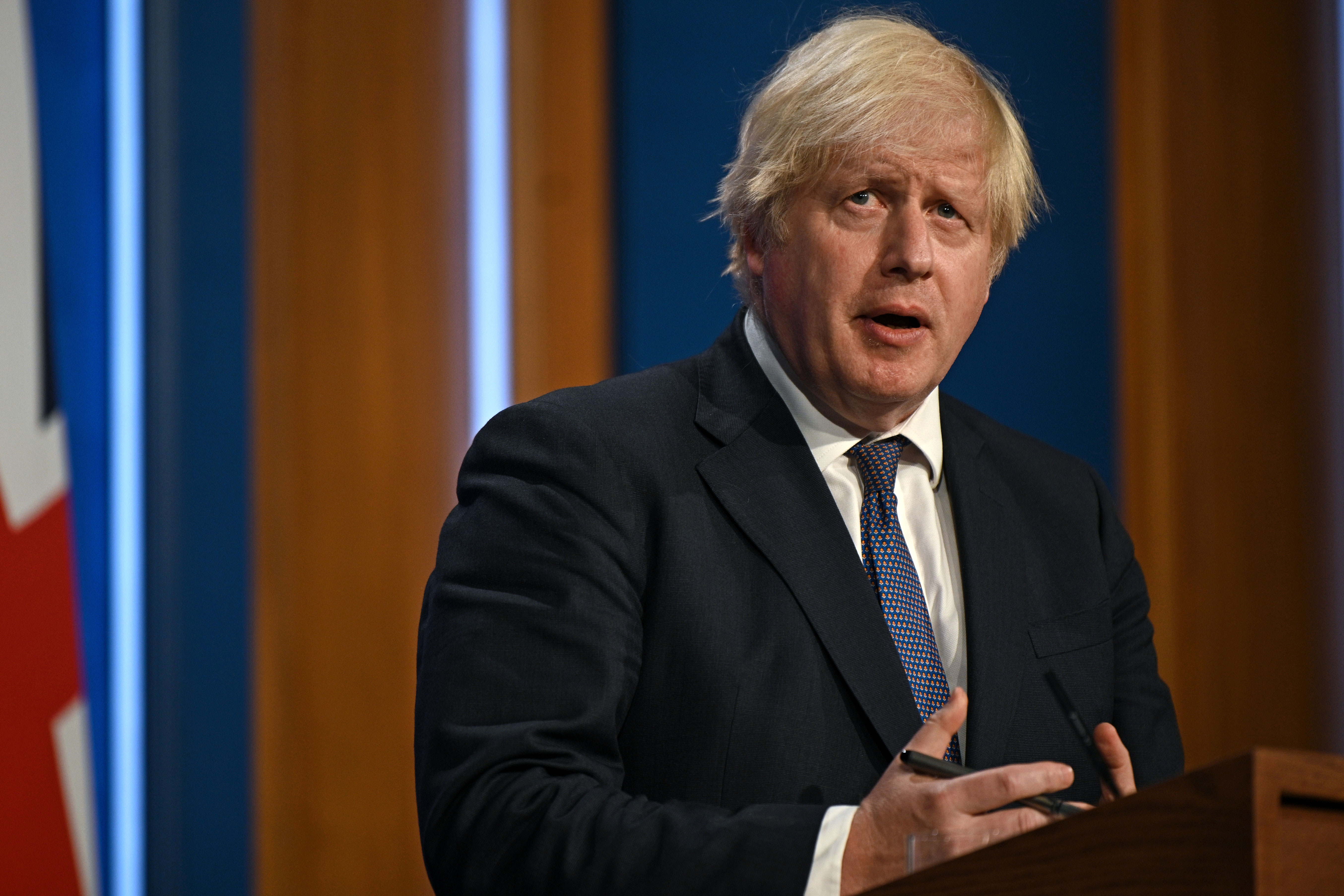 British Prime Minister Boris Johnson speaks in London on July 12, 2021.