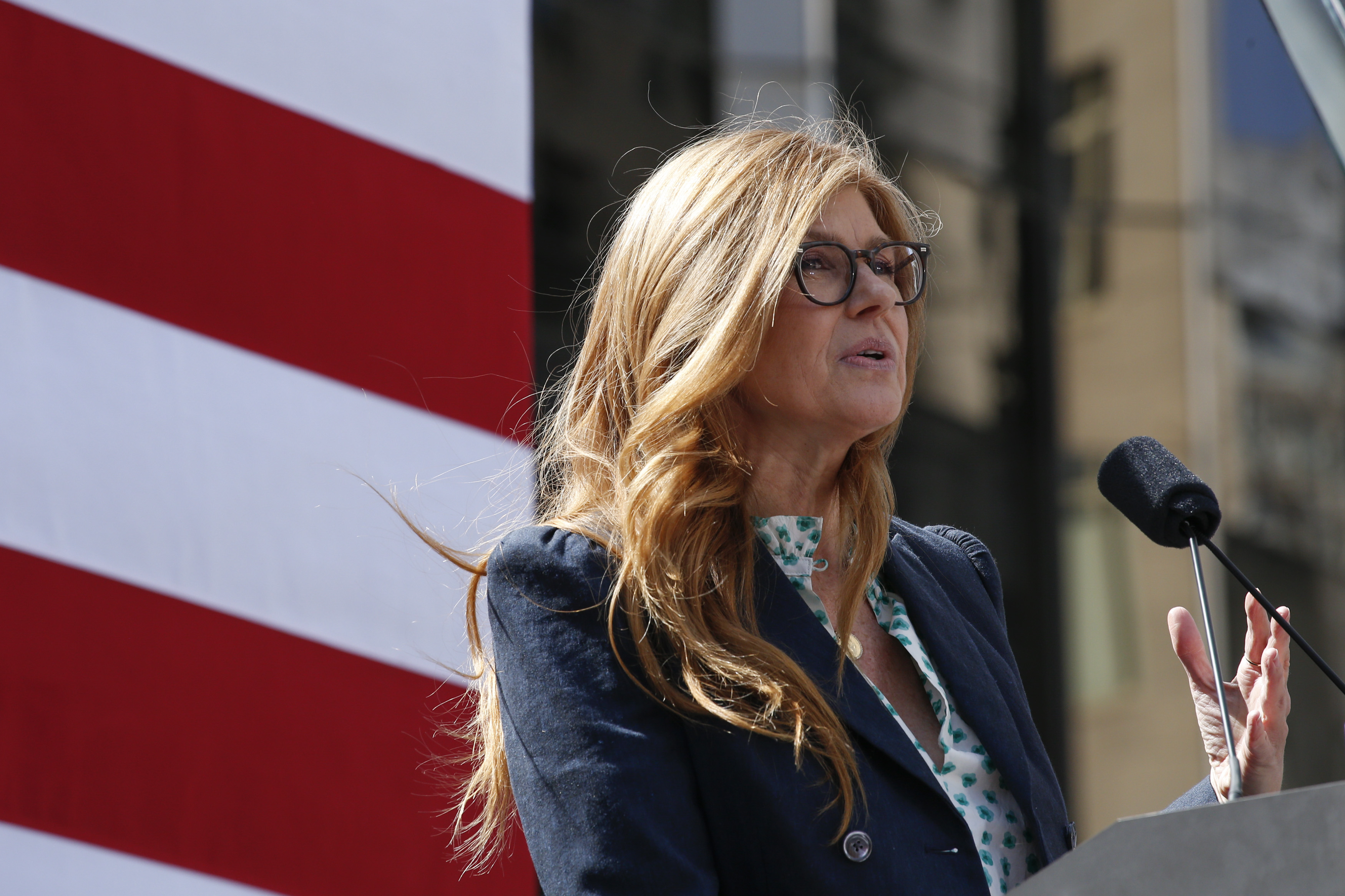 Connie Britton speaks in support of Democratic presidential candidate U.S. Sen. Kirsten Gillibrand speaks during a rally in front of Trump International Hotel & Tower on March 24, 2019 in New York City.