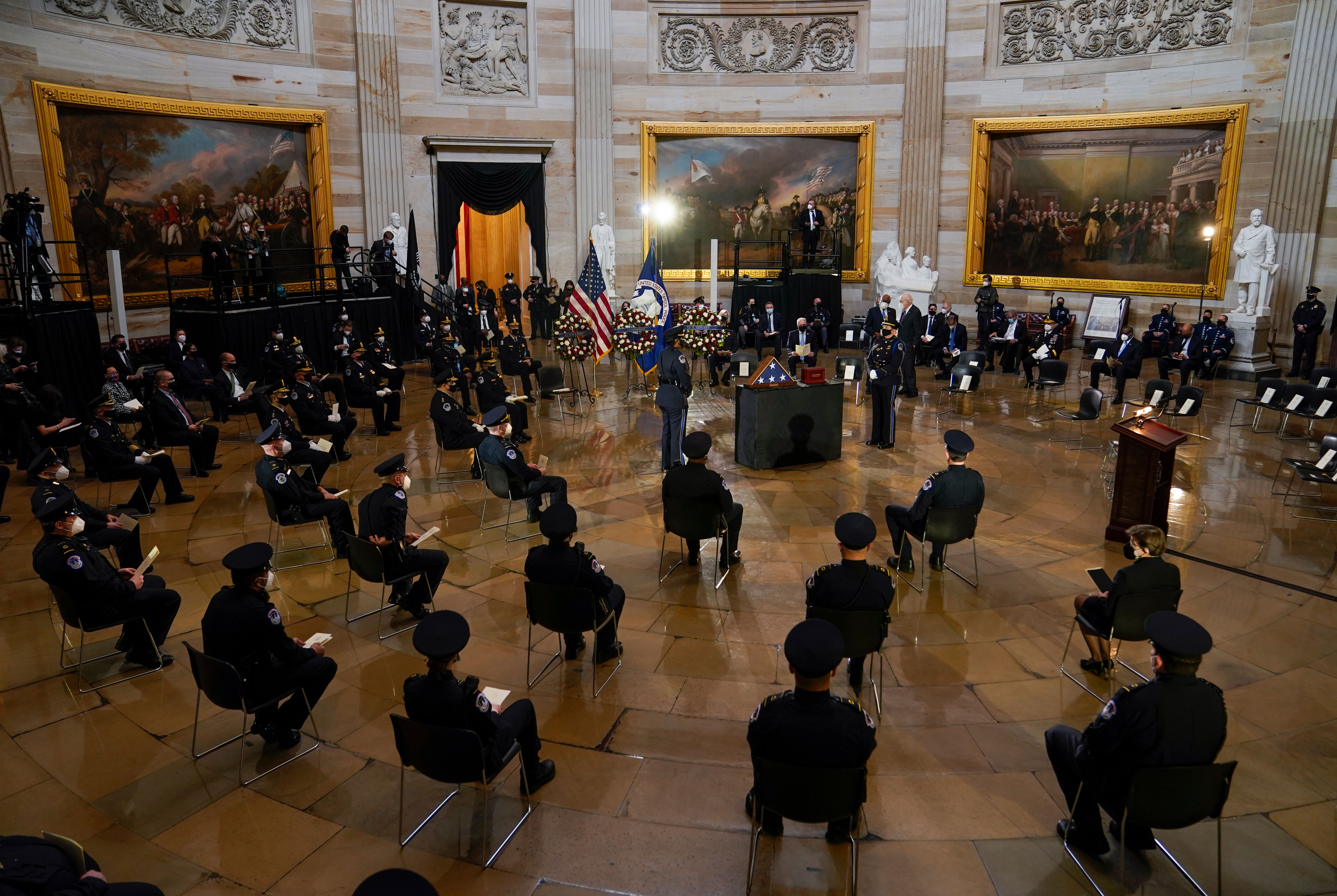 Guests are seated in the Capitol Rotunda on February 3 before a ceremony to honor Officer Brian Sicknick.