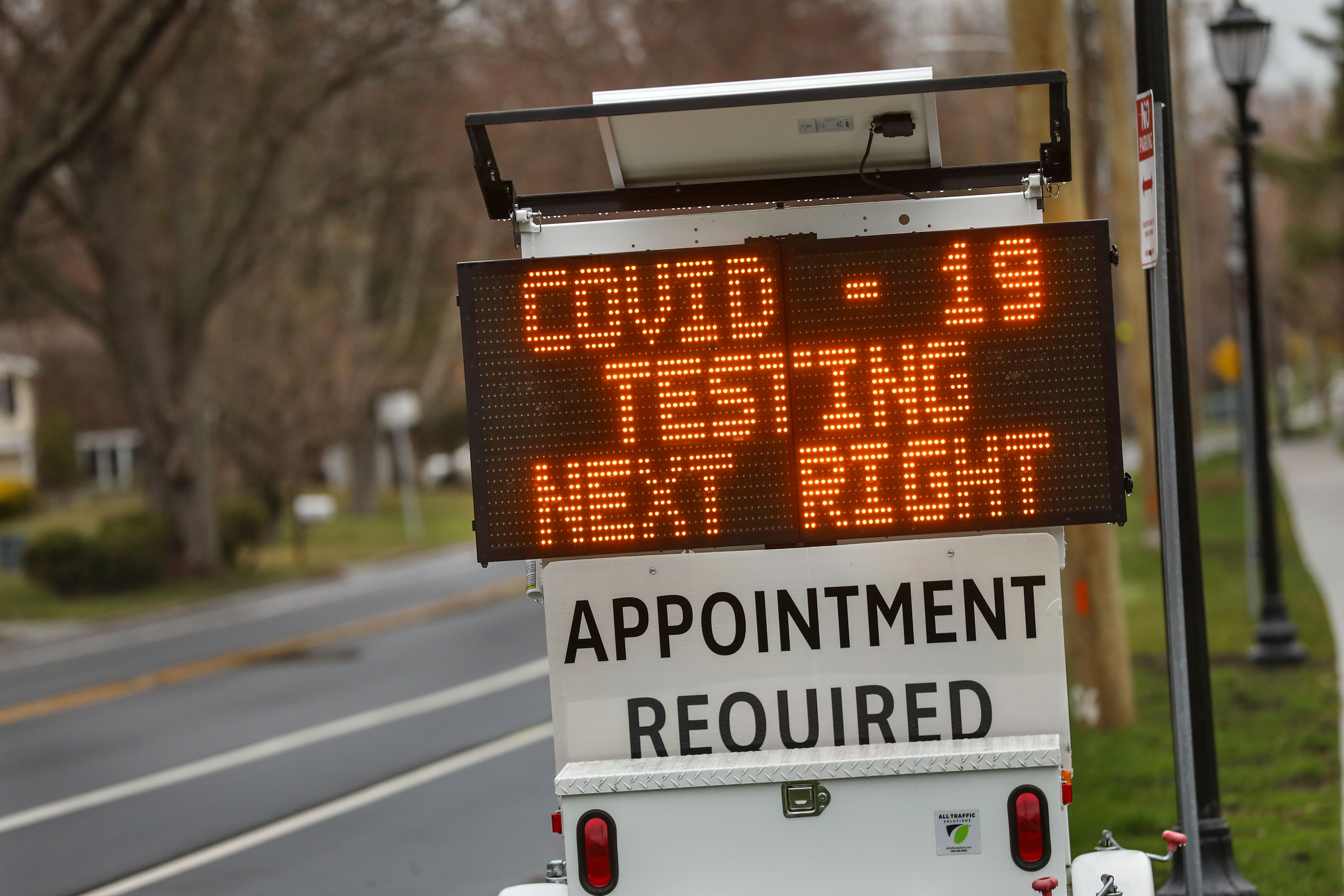 A sign in Stony Brook, New York on Long Island directs patients to a drive-thru coronavirus test site at Stony Brook University on March 28.