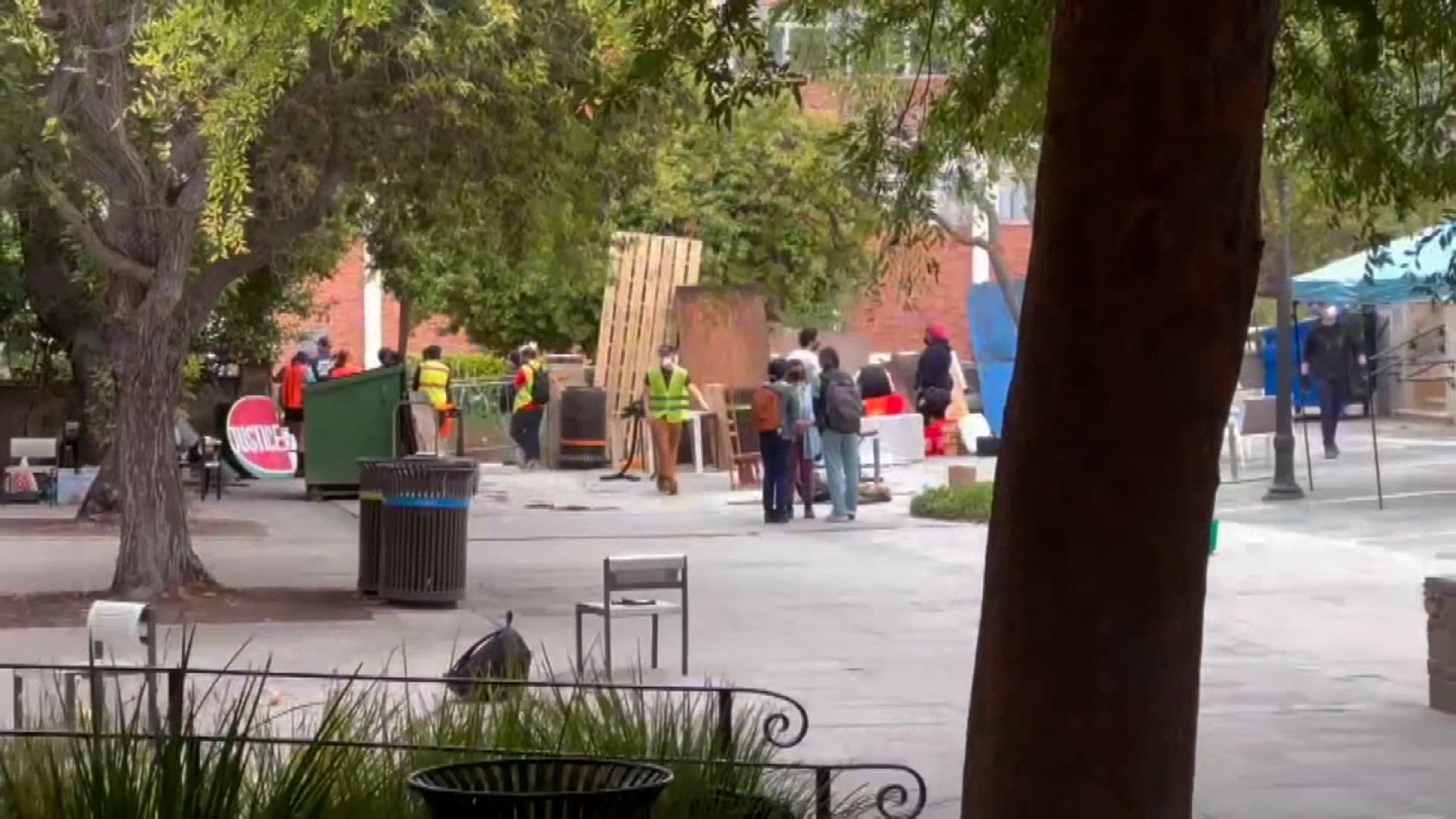 A screengrab from a video shows a barricade set up by protesters today on UCLA’s campus in Los Angeles, CA.