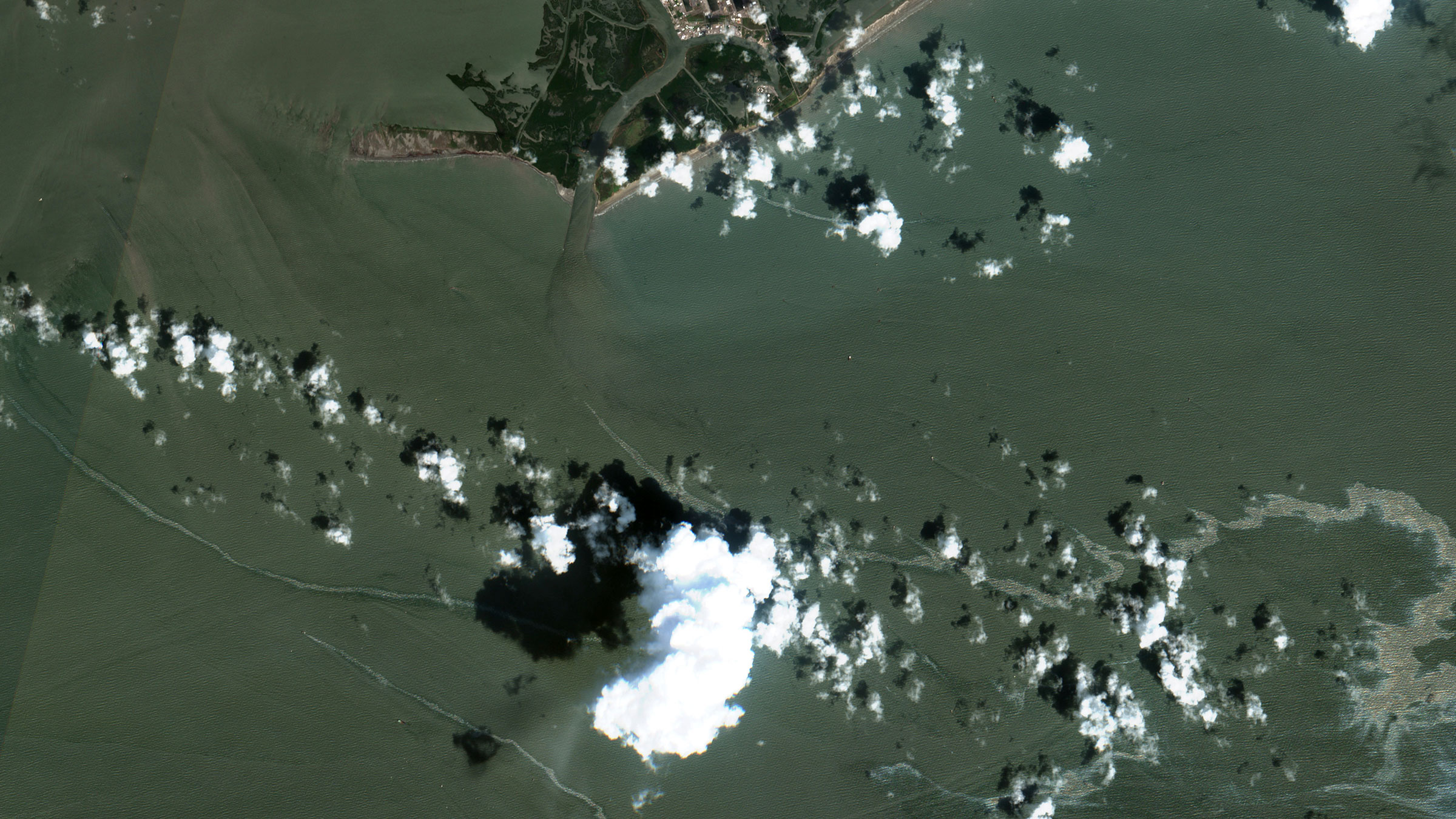 In this satellite image provided by Maxar Technologies, an oil slick is seen south of Port Fourchon, Louisiana, on Thursday.