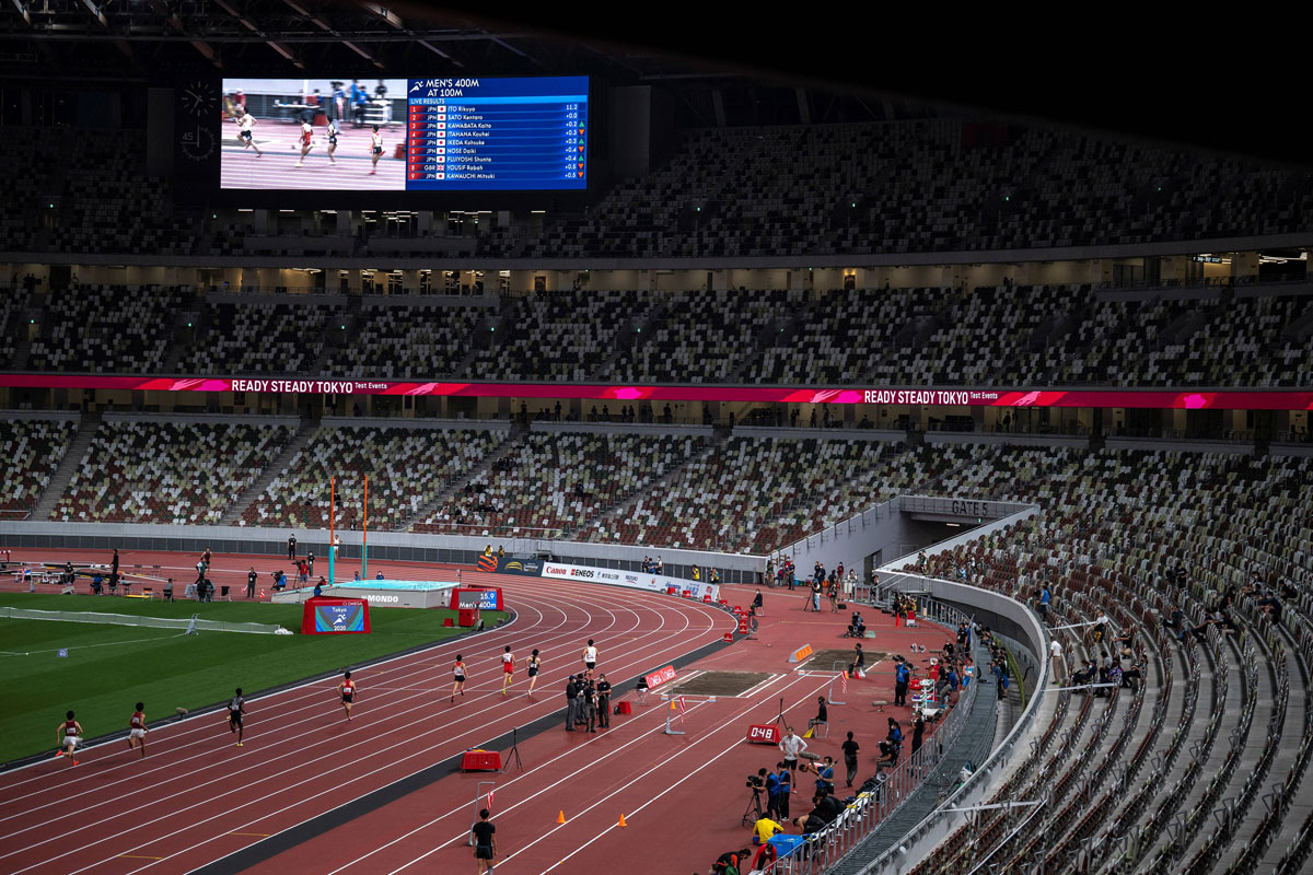 Athletes compete in the 400m race test event for the 2020 Tokyo Olympics at the National Stadium in Tokyo, Japan on May 9.