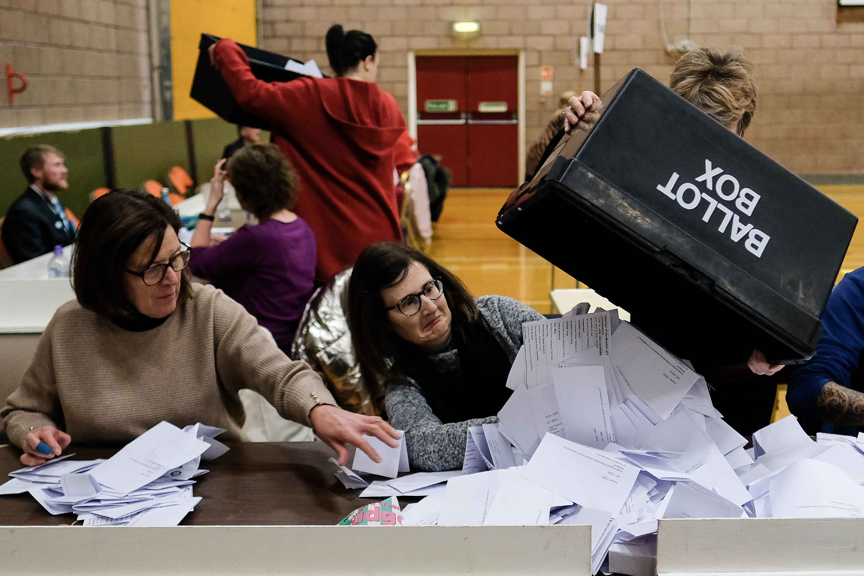 Volunteers begin to count ballot papers in Hartlepool, England. Photo: Ian Forsyth/Getty Images