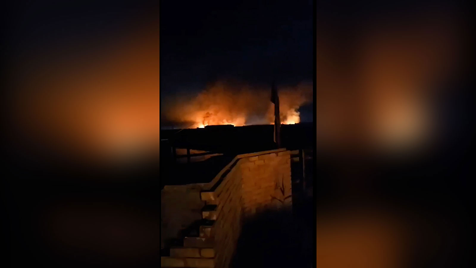 Flames from a large explosion near Babylon, Iraq, can be seen in an image taken from video obtained by CNN from social media.