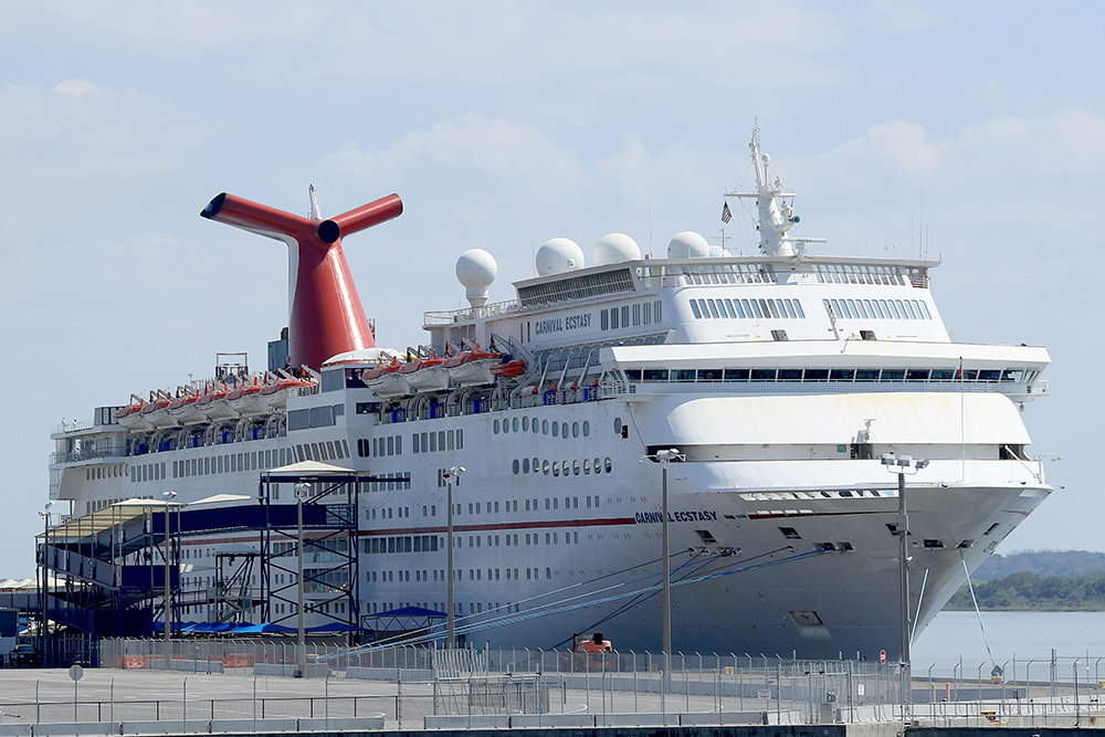 Carnival Cruise Line's Carnival Ecstacy cruise ship is docked at the Port of Jacksonville amid the Coronavirus outbreak on March 27 in Jacksonville, Florida.