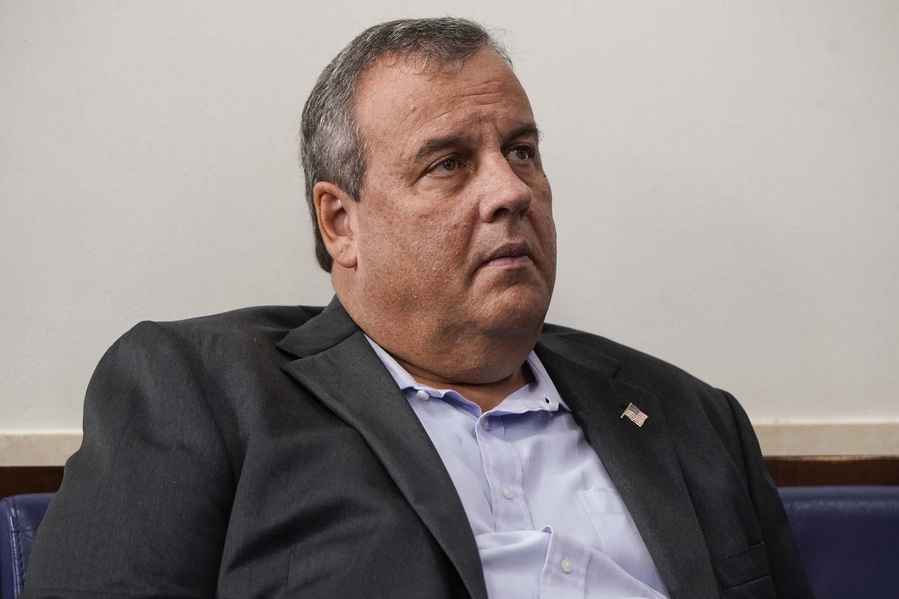 Former New Jersey governor Chris Christie listens as President Trump speaks during a news conference at the White House on September 27.