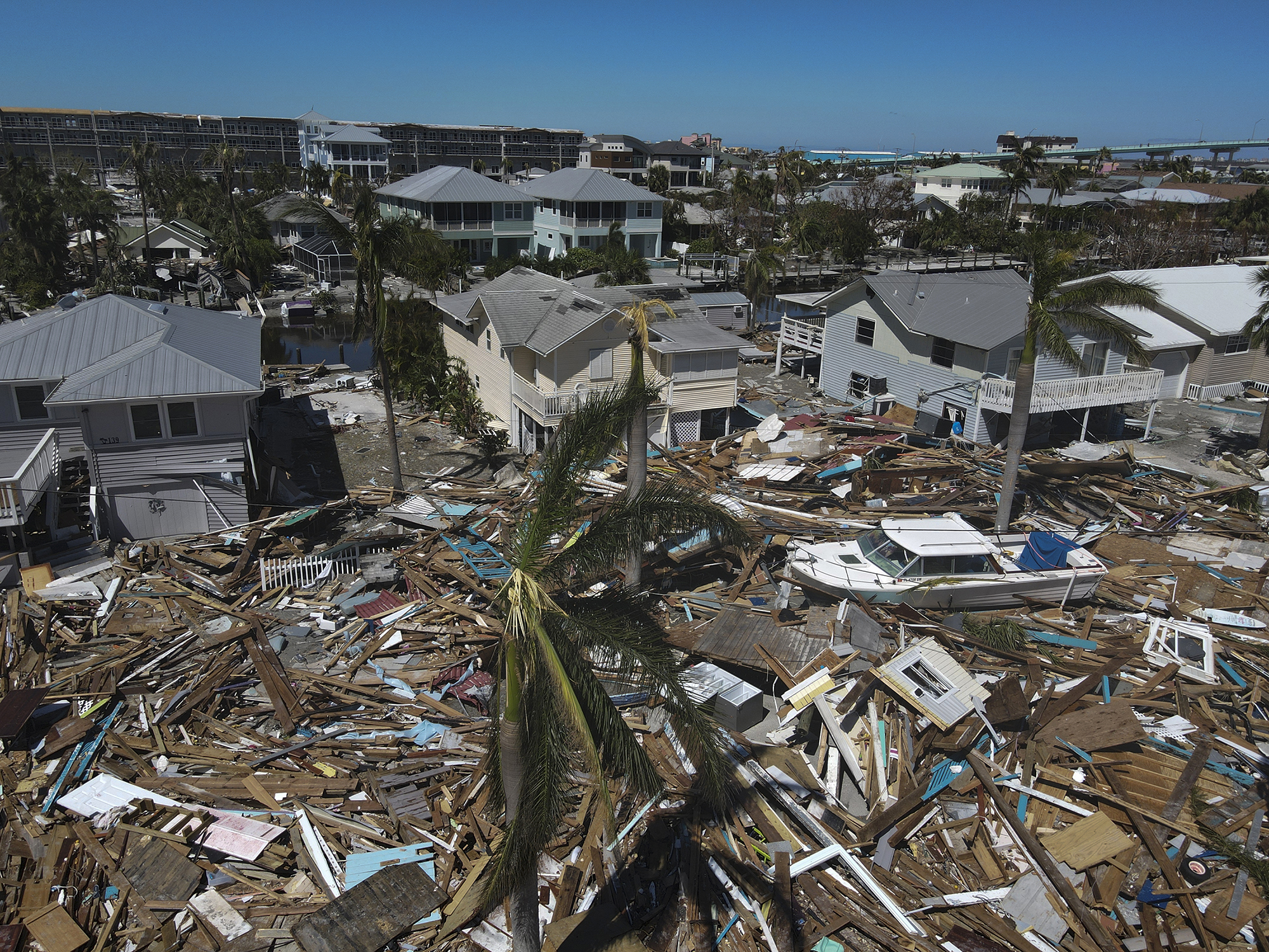 A drone image shows debris amid damaged homes following the passage of Hurricane Ian, in Fort Myers Beach, Florida on Friday, September 30. 