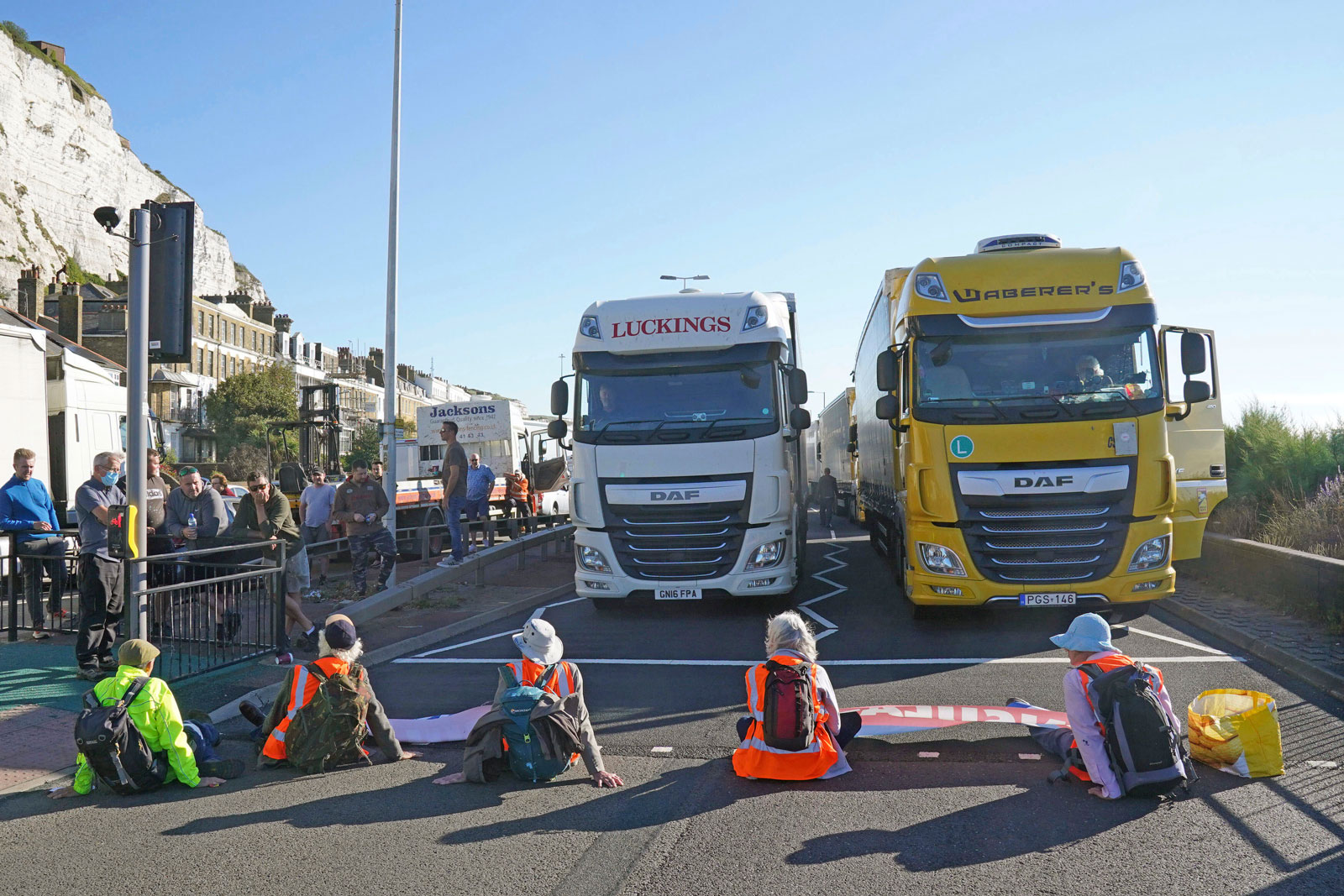 Protesters from Insulate Britain block the A20 which provides access to the Port of Dover, in Kent, England on Friday, Sept. 24.