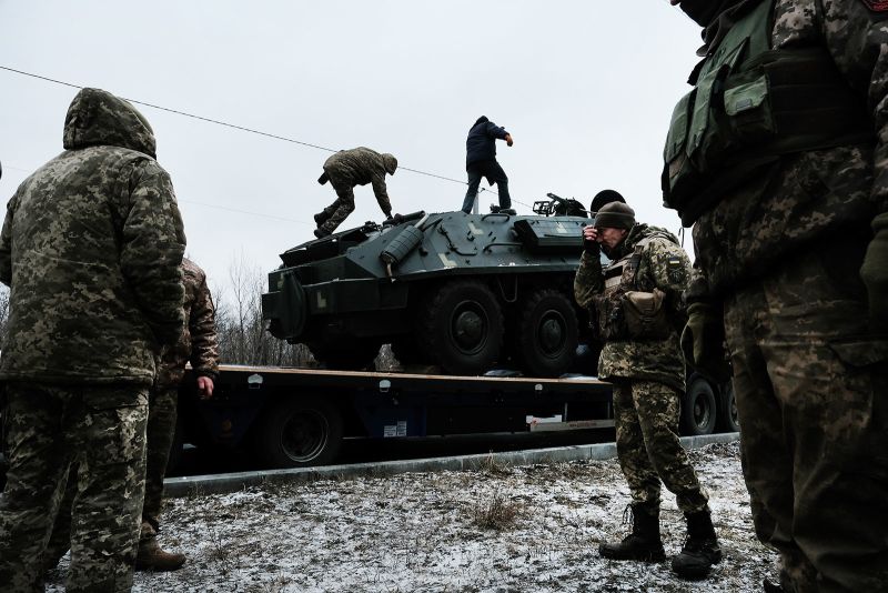 A Ukrainian military vehicle is unloaded in Druzhkivka, Ukraine, on January 13.