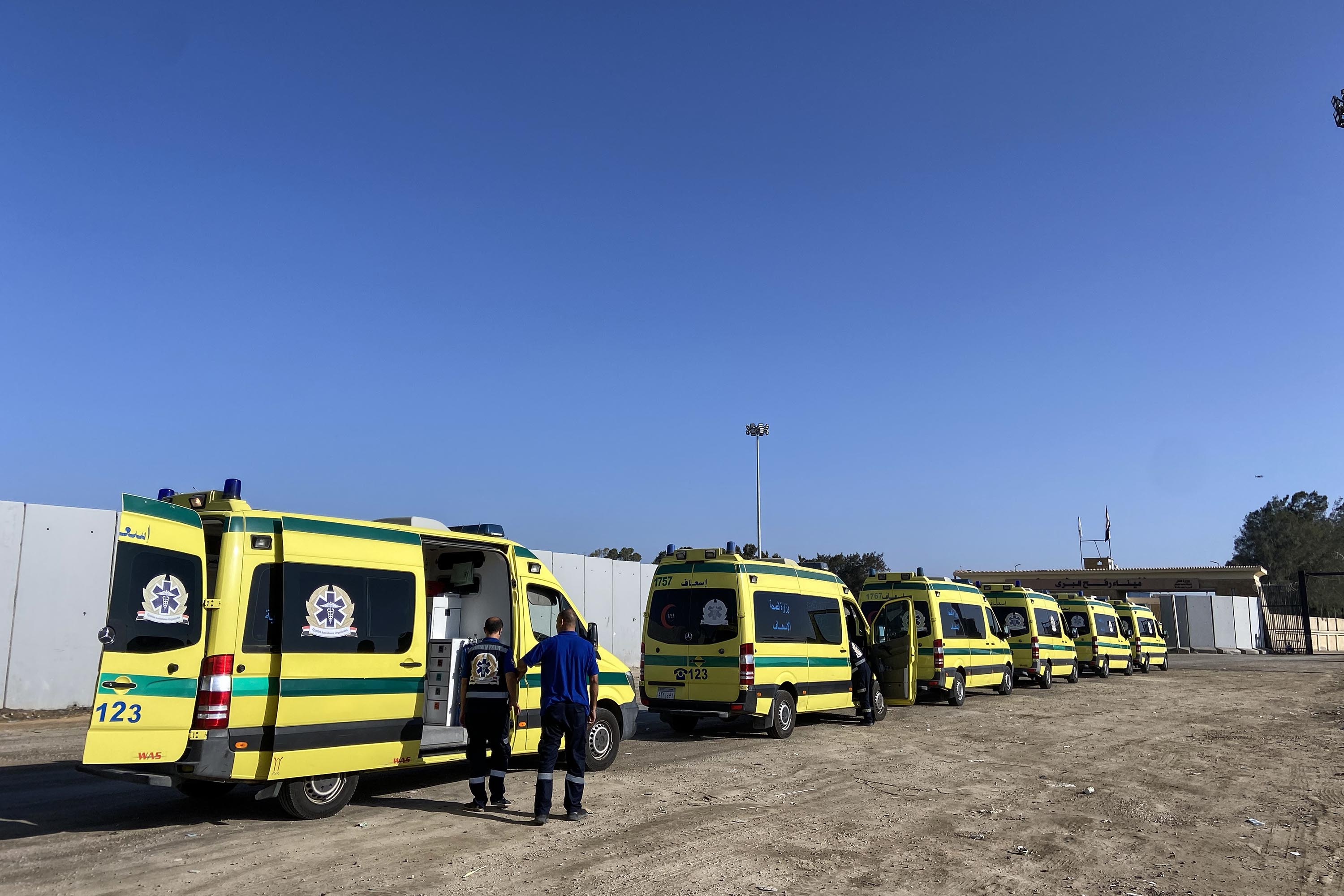 Ambulances queue on the Egyptian side of the Rafah border crossing with Gaza on November 6.