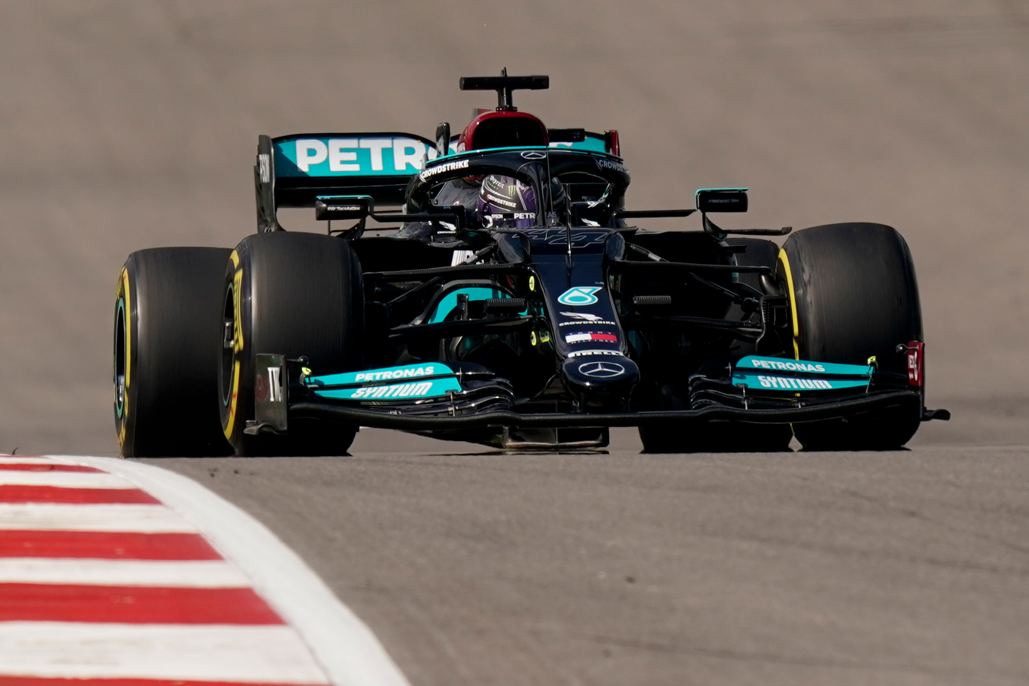 Mercedes driver Lewis Hamilton, of Britain, races in the Formula One US Grand Prix at the Circuit of the Americas on October 24 in Austin, Texas. 