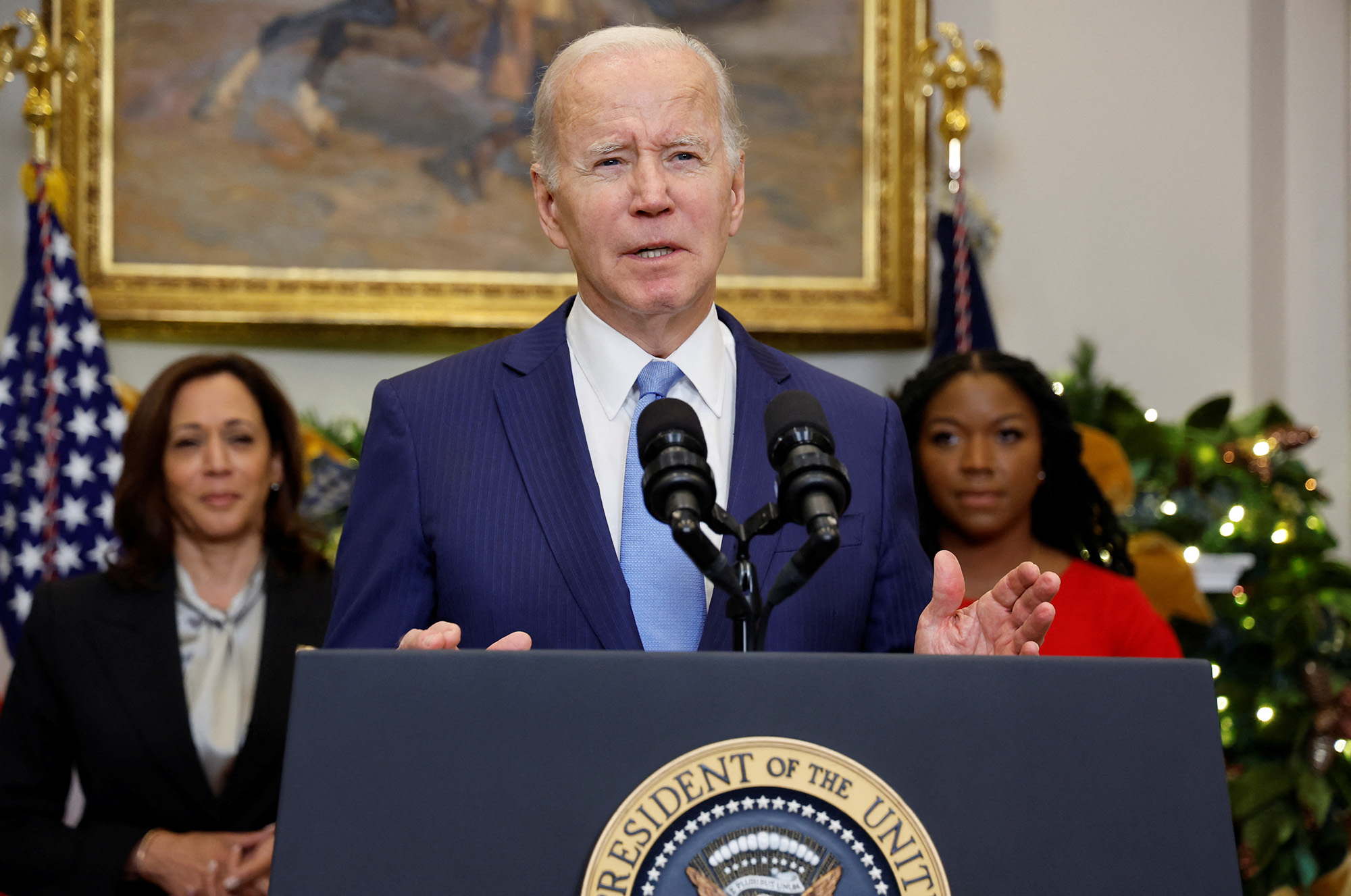 U.S. President Joe Biden speaks to reporters about the release of WNBA basketball star Brittney Griner by Russia, as Vice President Kamala Harris and Cherelle Griner listen, in the Roosevelt Room at the White House in Washington D.C, on December 8.