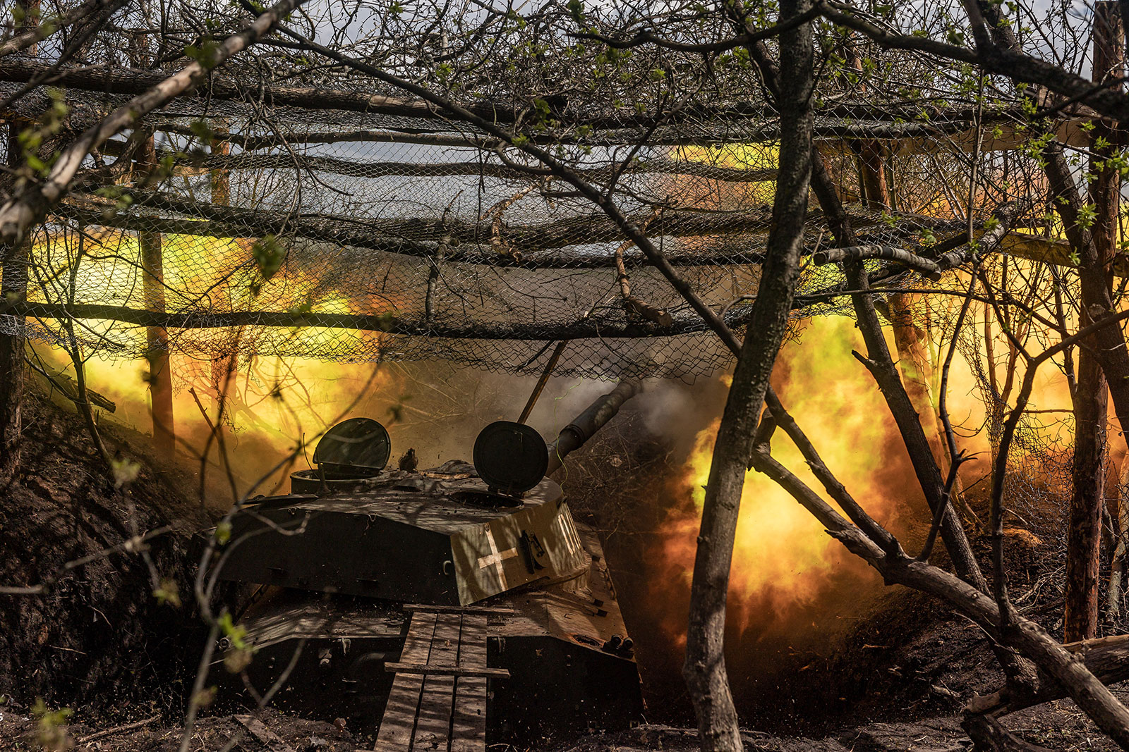 Ukrainian soldiers of the 80th brigade fire artillery in the direction of Bakhmut in Donetsk Oblast, Ukraine, on April 24. 