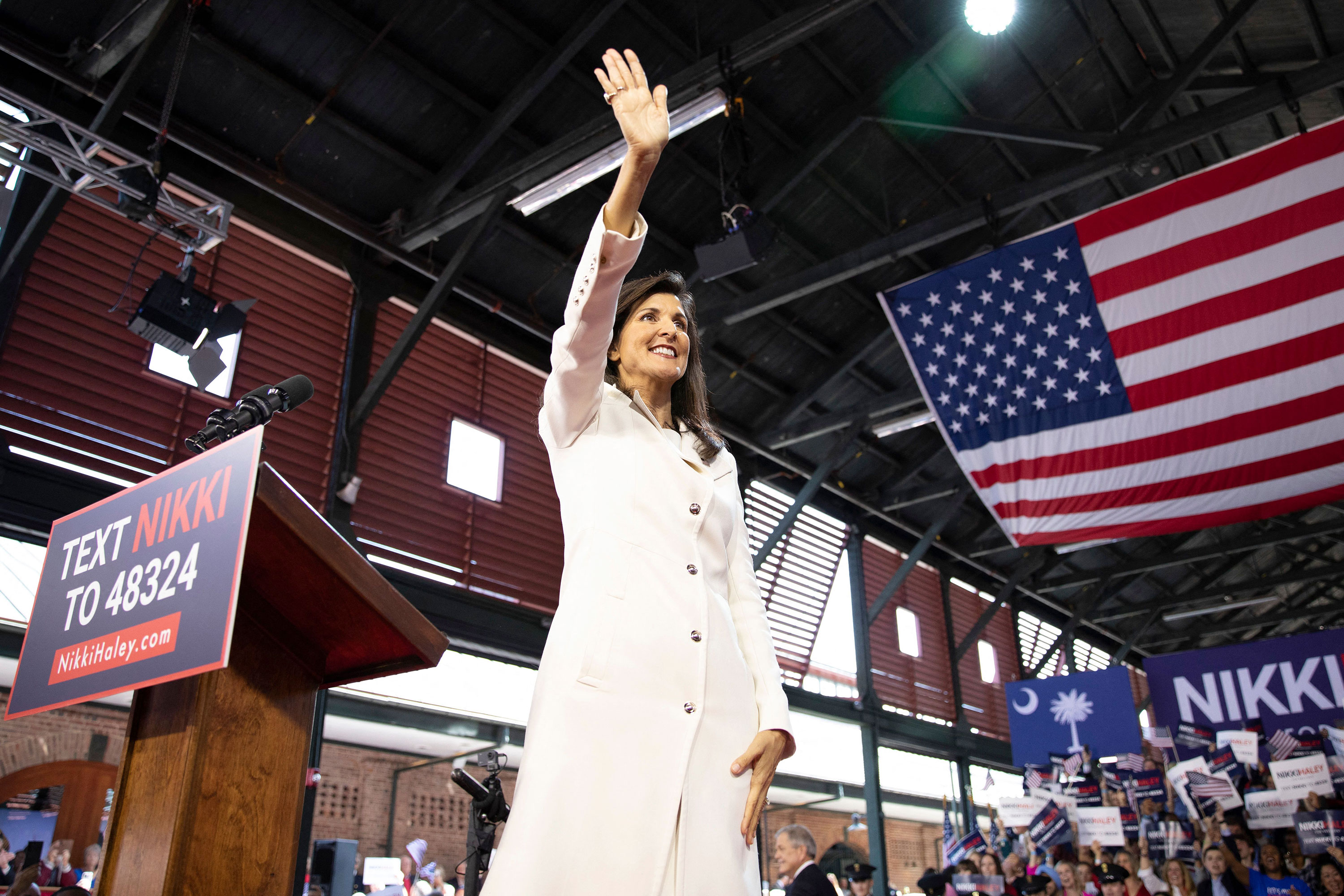 Former South Carolina Republican Gov. Nikki Haley waves during a campaign event at the Charleston Visitor Center in Charleston, South Carolina, on February 15. 