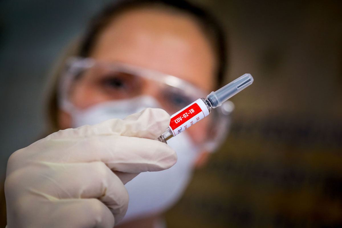 A nurse shows a COVID-19 vaccine produced by Chinese company Sinovac Biotech at the Sao Lucas Hospital in Porto Alegre, Brazil on August 08.
