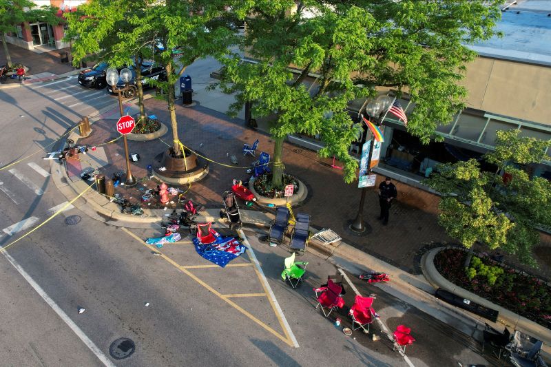 People’s belongings lie abandoned along the parade route on Tuesday.
