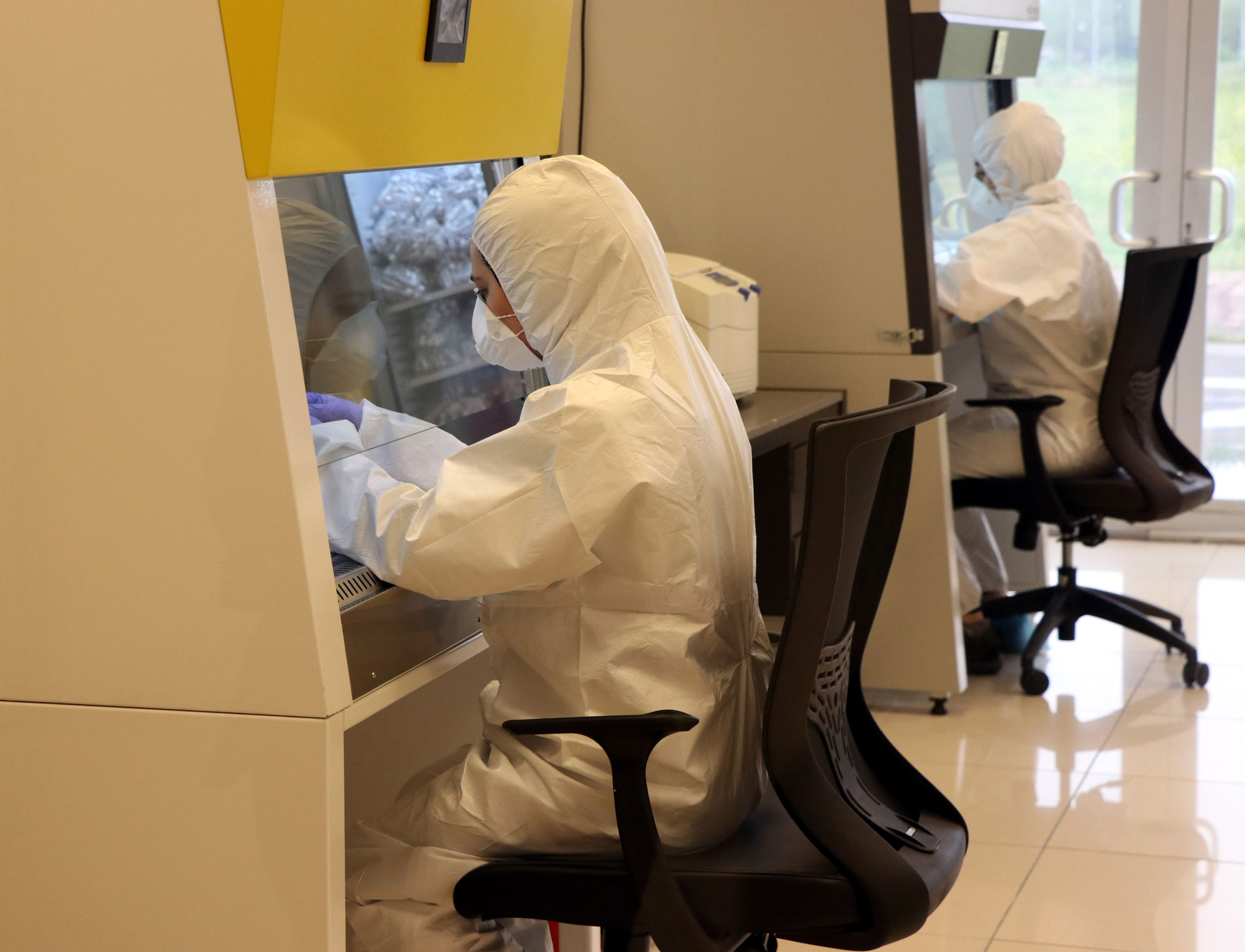 Lab employees perform testing on samples for coronavirus at a Covid-19 diagnosis center in Kocaeli, Turkey on May 5.