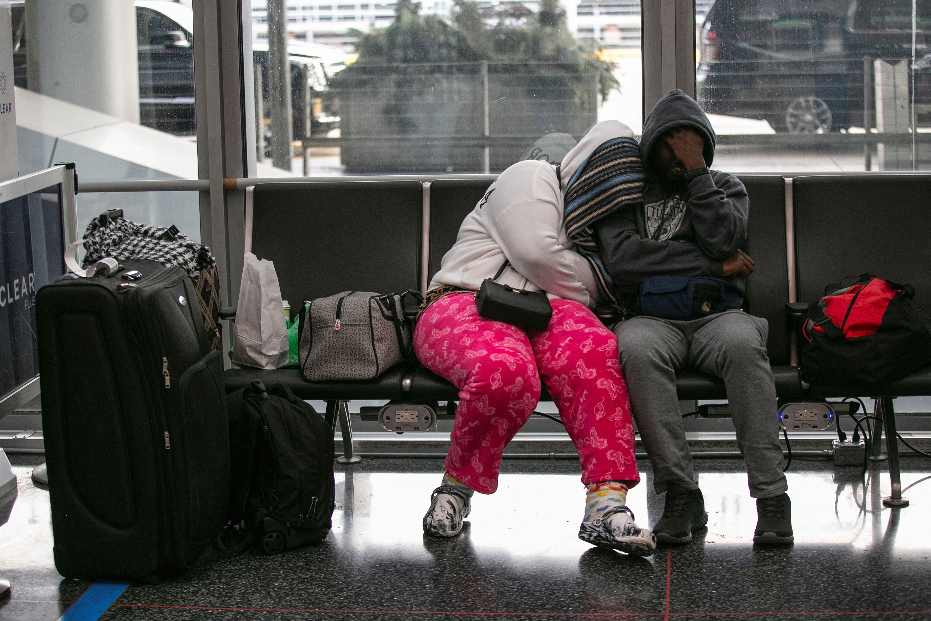 Passengers wait for the resumption of flights at O'Hare International Airport in Chicago on Wednesday.