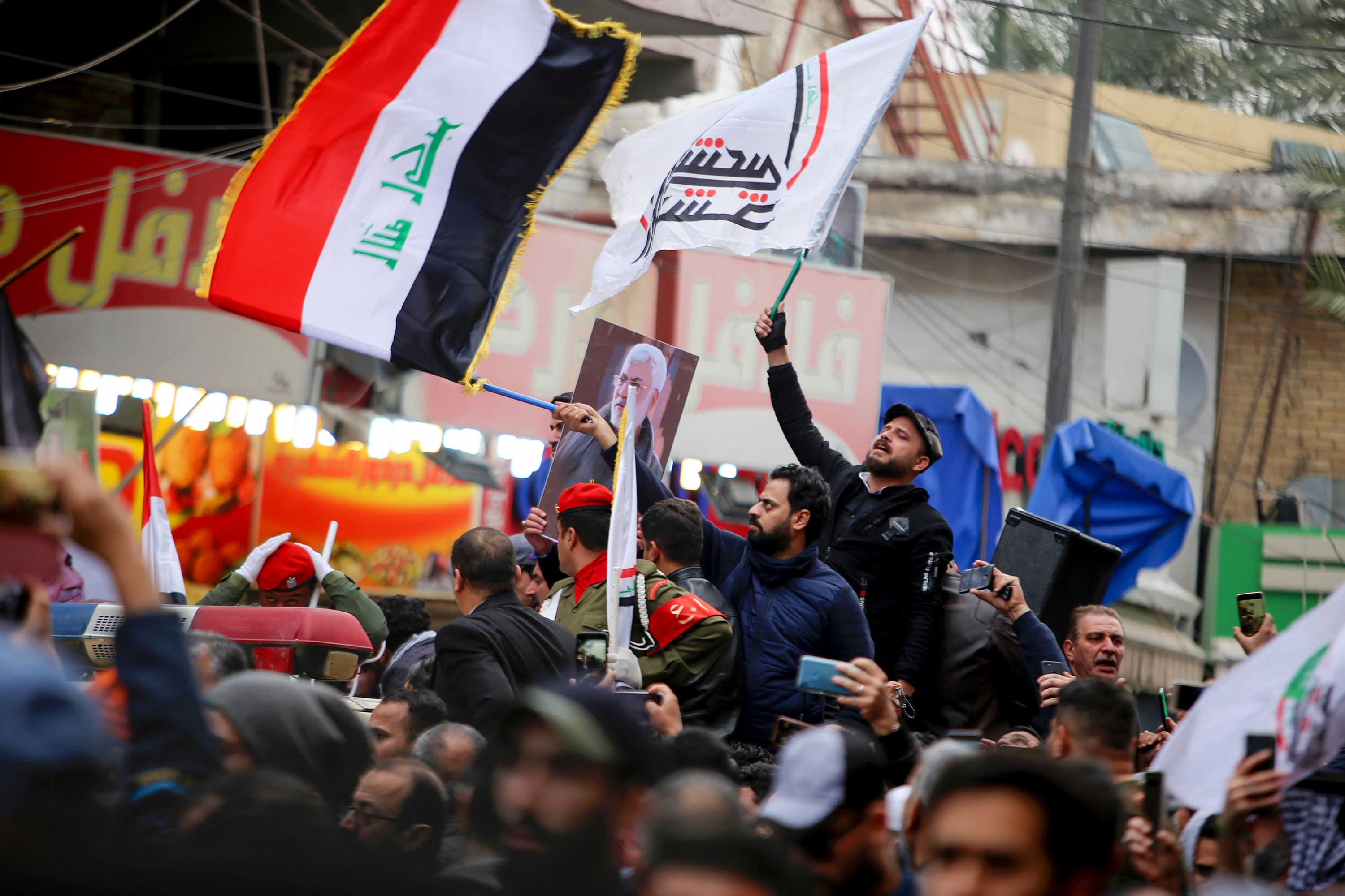 Mourners at a funeral procession in Kadhimiya, Baghdad, on January 4, 2020.