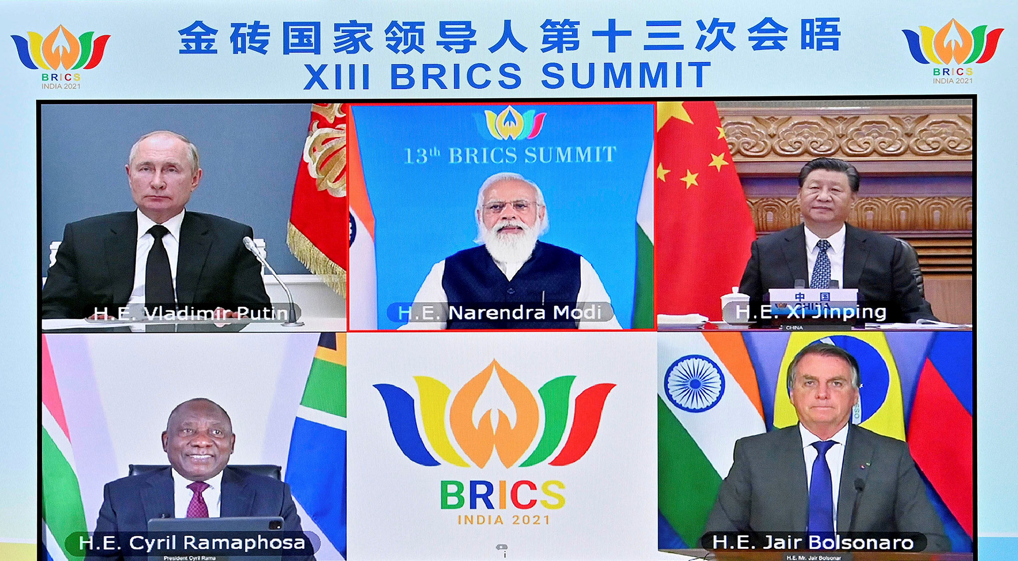 Russian President Vladimir Putin, top left, along with Chinese President Xi, South African President Cyril Ramaphosa, Brazilian President Jair Bolsonaro and the host, Indian Prime Minister Narendra Modi, attend the 13th BRICS summit via video link on September 9, 2021. 