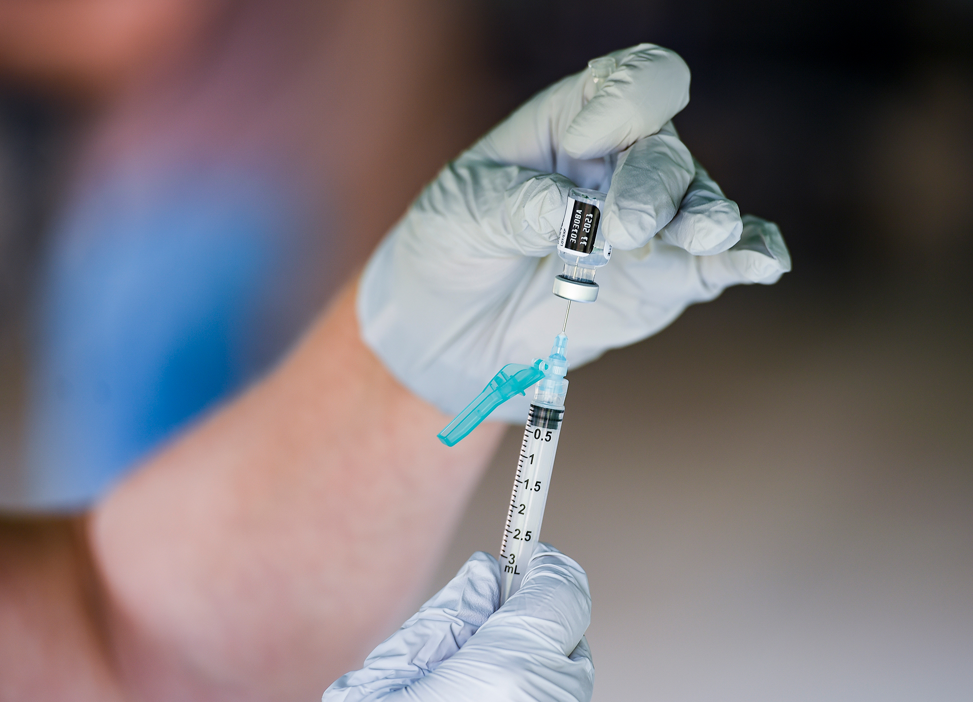 A nurse fills a syringe with a dose of the Pfizer-BioNTech Covid-19 vaccine in Reading, Pennsylvania, on September 14. 